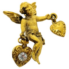 KIRKS FOLLY – Vintage-Brosche in Goldoptik mit Strasssteinen, Herz, Engel und Cherub