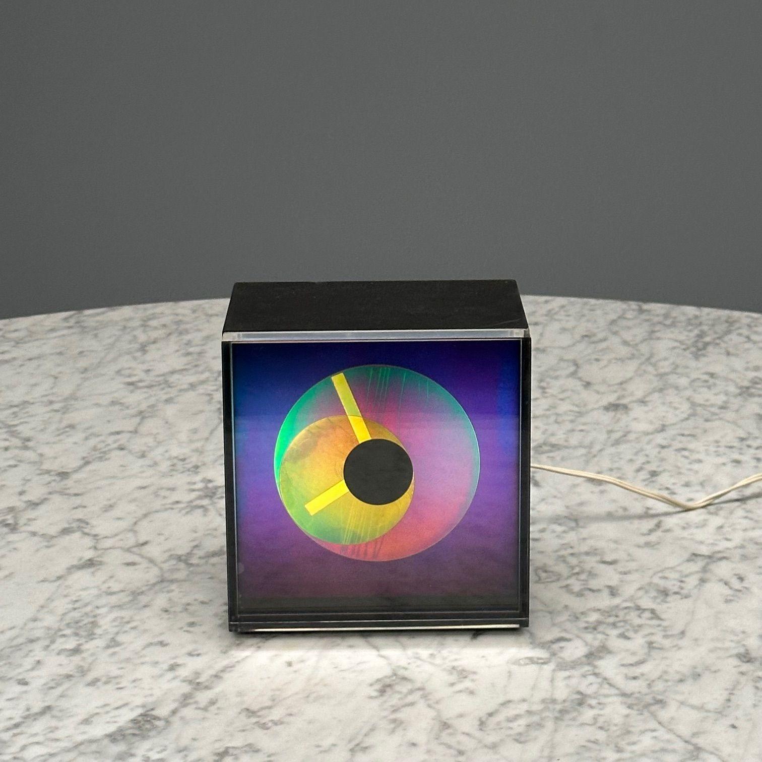American Mid-Century Modern Prisma aluminum aurora clock, Kirsch Hamilton, 1970s.

A vintage 1970s Aurora clock. These stunning clocks are in the collection of the Museum of Modern Art MOMA in NY. Developed in the 1970s by a NASA engineer and an