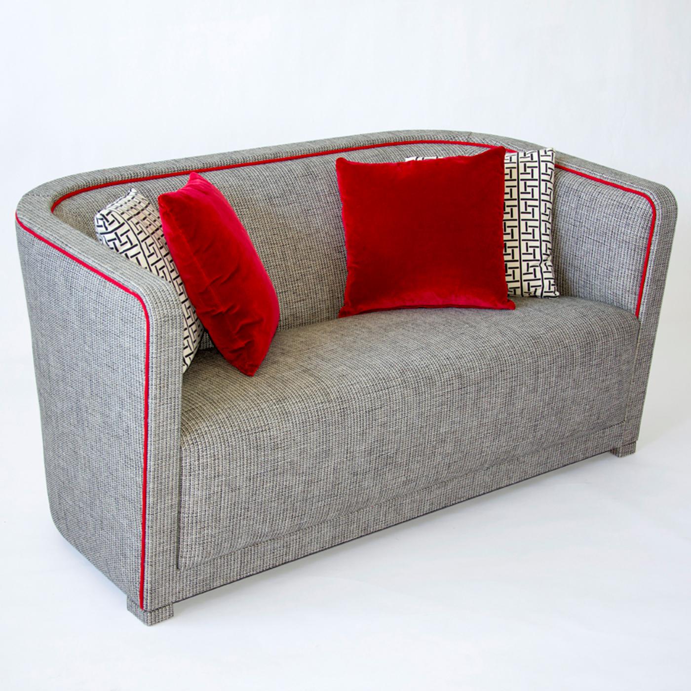 A cozy seat for two that is elegant and comfortable, this love seat can be displayed in a small entryway, a study or office, or in a bedroom. Elegant and modern, this piece is an ideal choice to add a welcoming accent to any interior. Its enclosing