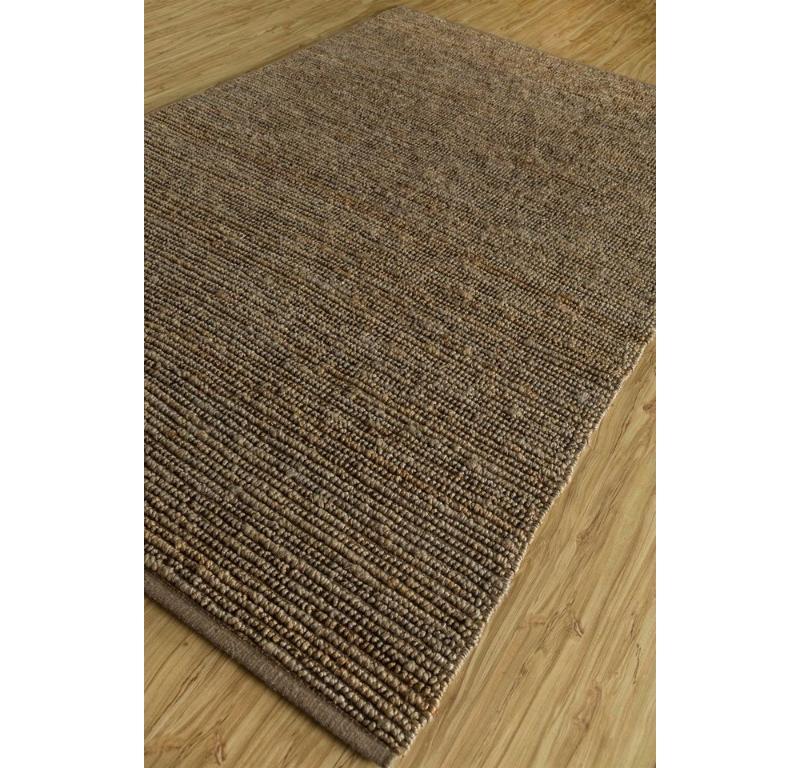 ¿Te has preguntado alguna vez cómo se siente la serenidad bajo los pies? No busques más, esta alfombra plana de madera de fresno es una obra maestra del diseño minimalista. Imagina suaves degradados de ceniza susurrando por la superficie, creando un