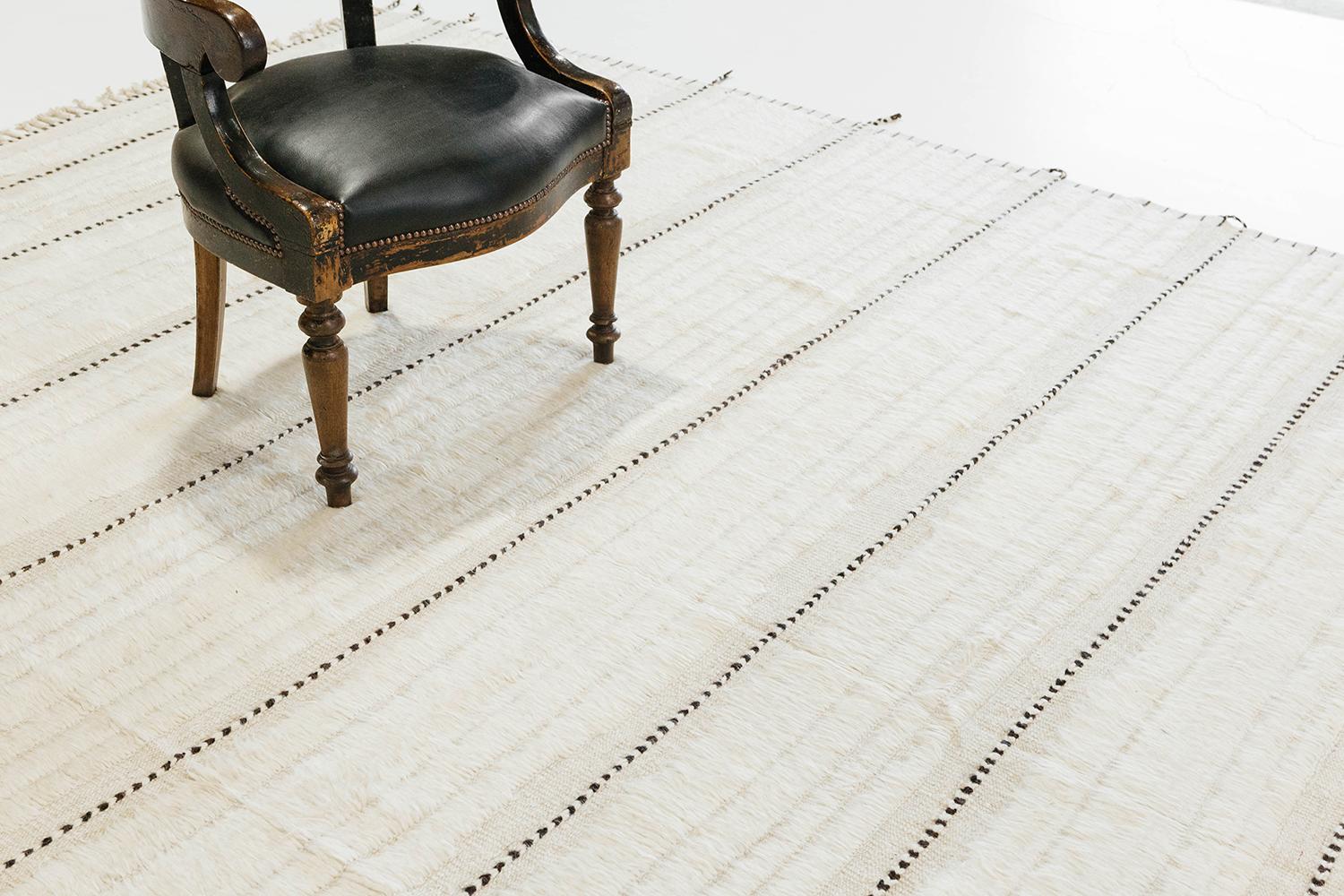 Kit Moresby' has become an Los Angeles staple. The signature rug of Malibu. Hand woven of luxurious wool, with timeless design elements and color palette. This Mehraban design is a contemporary interpretation of an Azilal, a part of our Atlas