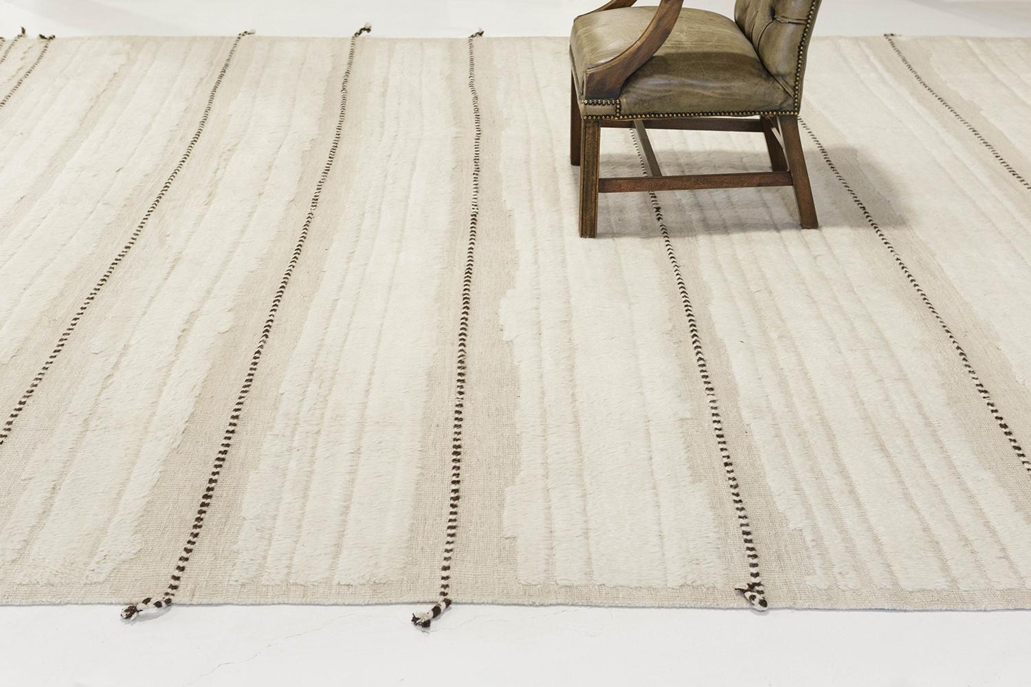 'Kit Moresby' has become a Los Angeles staple. The signature rug of Malibu. Handwoven of luxurious wool, with timeless design elements and color palette. This Mehraban design is a contemporary interpretation of an Azilal, a part of our Atlas