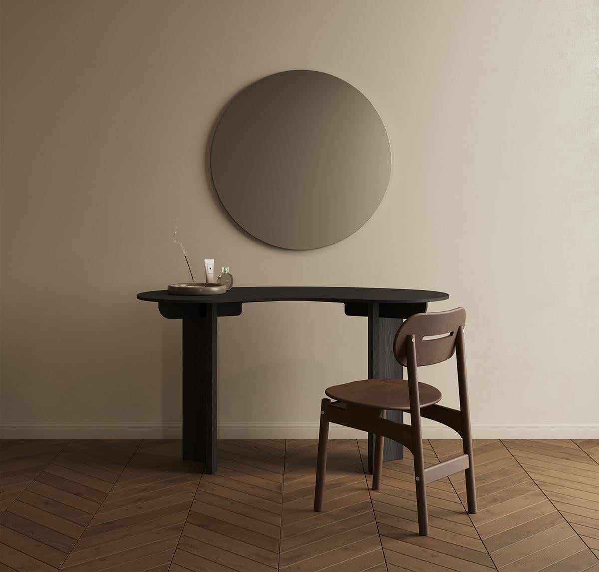 Flow Desk is an organic shaped table with a two-piece skeleton and curved legs. The linear pieces of the skeleton join into the legs to create a well-proportioned base for the table top. In other words, it is the reflection of Japandi-style Flow
