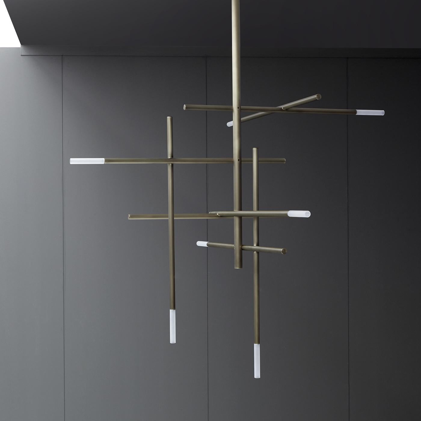 This elegant chandelier projects direct light from glazed glass diffusers mounted at the top of metal rods assembled to form a system of parallel and perpendicular lines. The finish of the metal can be in polished black nickel, polished gold, matte