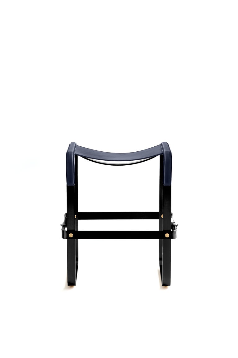 The Wanderlust contemporary counter stool belongs to a collection of minimalist and serene pieces where exclusivity and precision are shown in small details such as the hand-turned metal nuts and bolts that fix the leather surfaces, that go