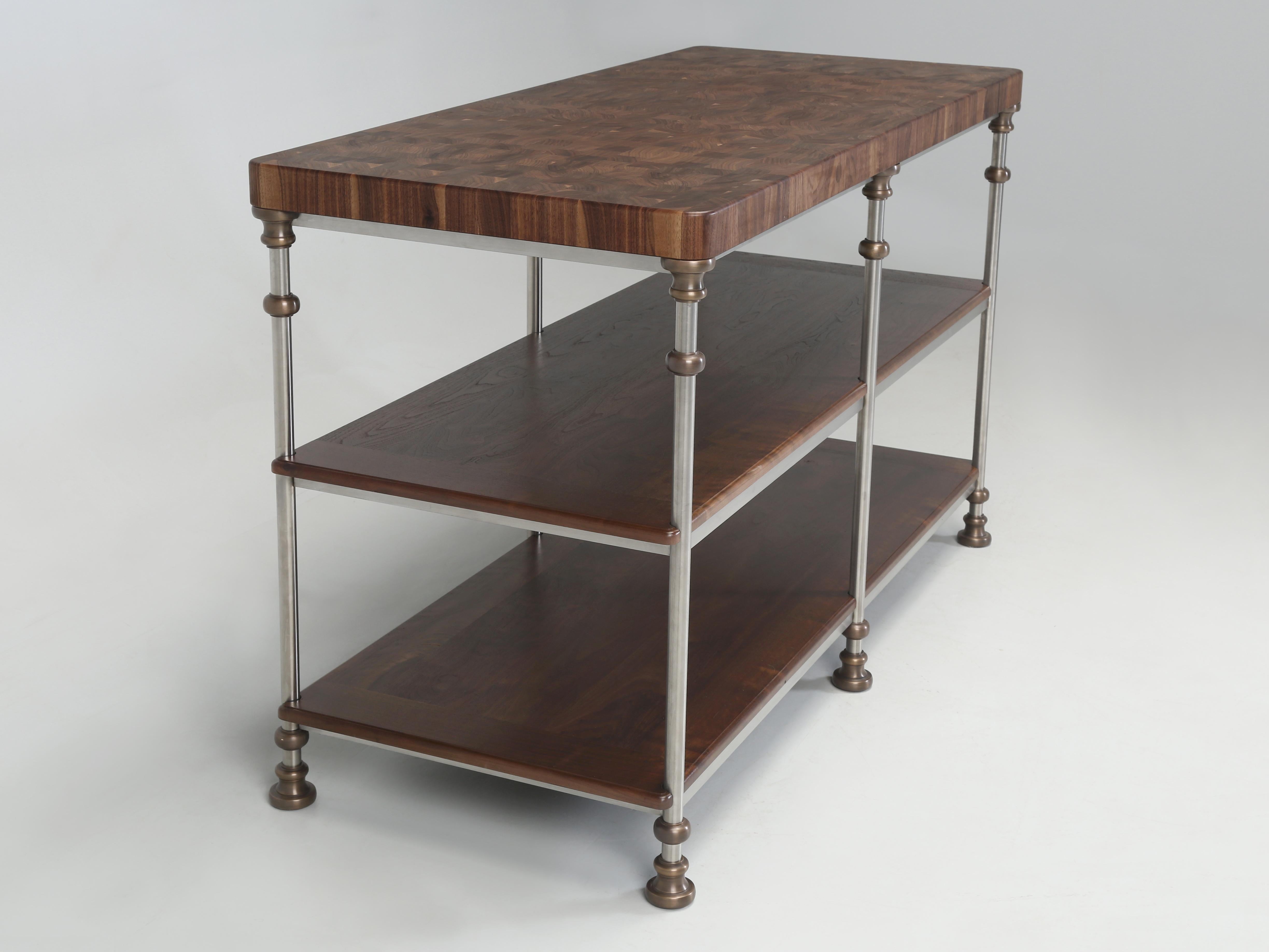 Kitchen Island made to order by Old Plank here in Chicago by artisans. This particular Kitchen Island showcases a simple stunning solid walnut Butcher Block top that pairs beautifully with the solid bronze fittings or donuts if you prefer. We build