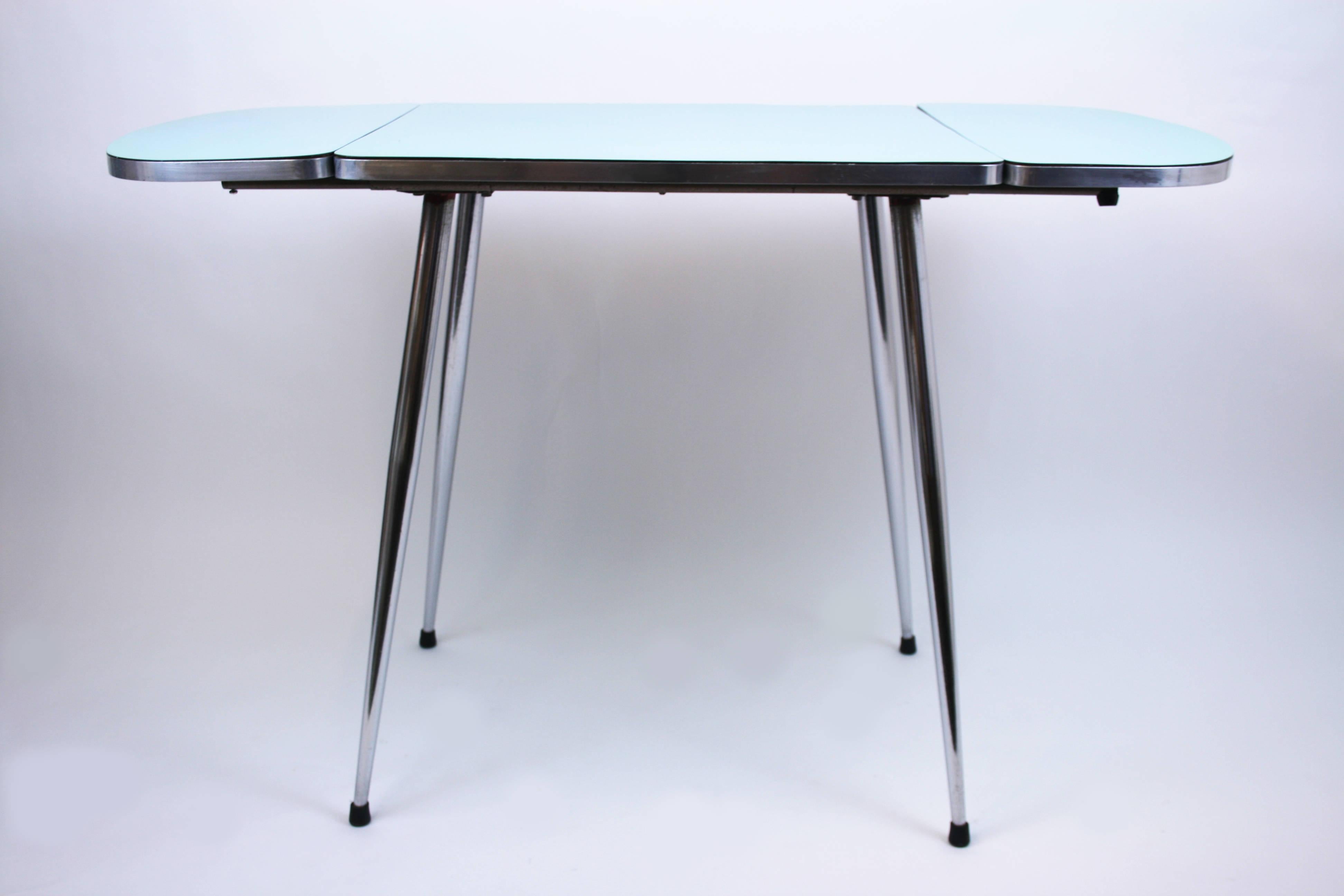 A very remarkable original French kitchen table with a light blue surface remaining in unrestored original condition. Due to the very high qualitative processing quality of the used materials the object is quite heavy weighted. Only small traces of