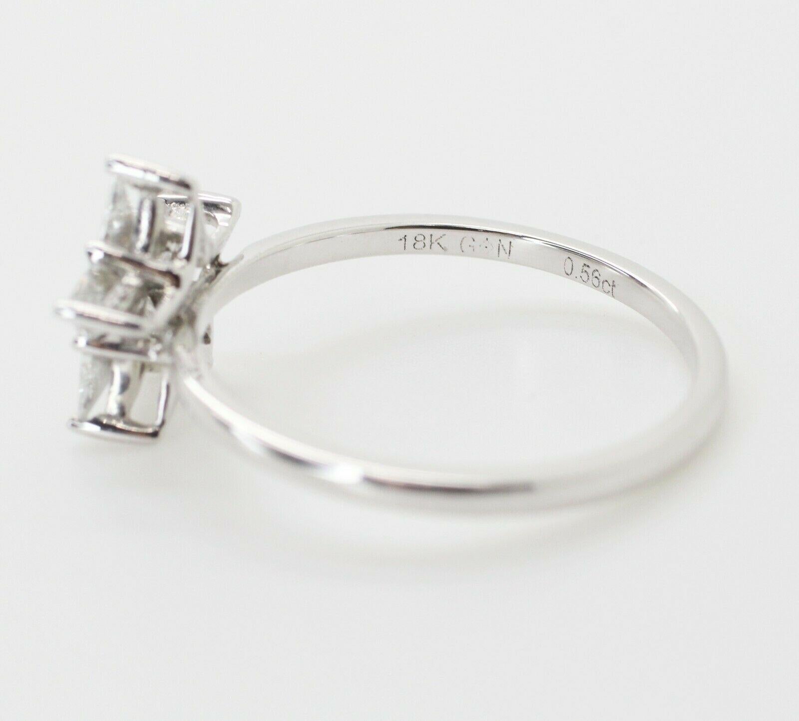  Specifications:
    MAIN stone: KITE CUT (STAR SHAPE)
    DIAMONDS: 5 PIECES
    CARAT TOTAL WEIGHT: approx 0.56 CTW
    COLOR/clarity: F/VS1 
    brand: UNBRANDED
    metal: 18K WHITE GOLD
    type: RING
    weight: 2.0 GRS 
    SIZE: 6US
   