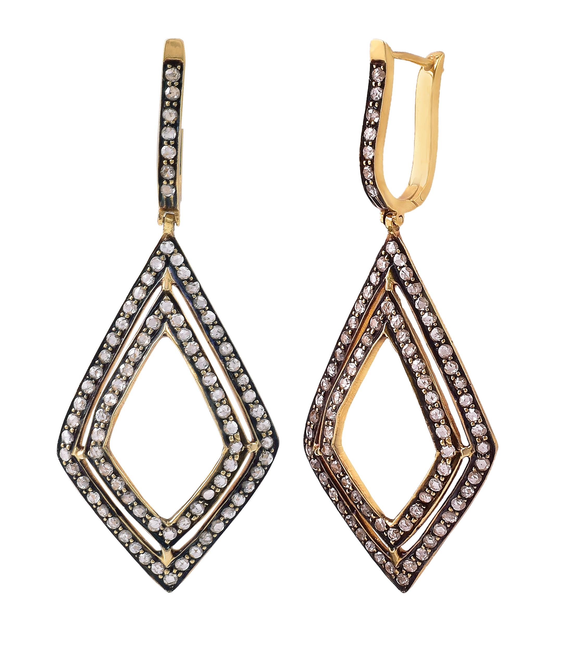 Diamond Dangle Earrings in Contemporary Victorian Style

This Victorian art-deco style diamond pave set kite shape long earring is marvelous. The bottom kite shape is elegantly formed with two rows of pave bezel set diamonds adjoined together with
