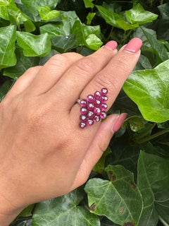 Anello di diamanti con perline di rubino a forma di aquilone