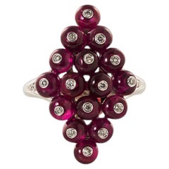 Anello di diamanti con perline di rubino a forma di aquilone