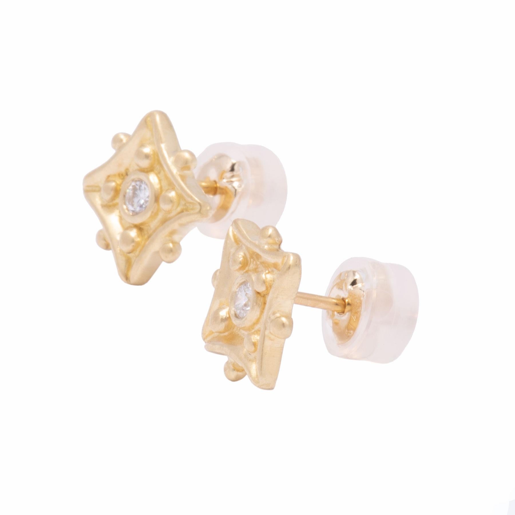 The perfect earrings for everyday wear, our Kite Stud Earrings are crafted in our studio in 18 karat gold and set with .10 tcw white diamonds. Gold beading between the points and at cardinal points around the round bright white diamonds accent the