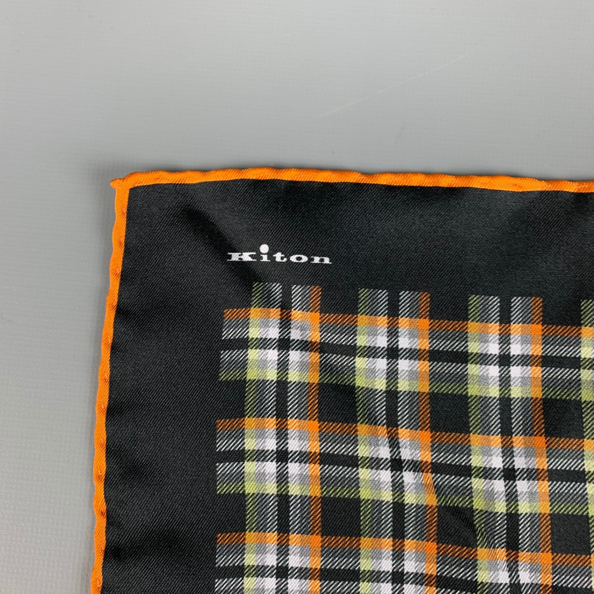 KITON
pocket square in a black silk fabric featuring orange and green plaid pattern, picture frame border, and luxurious hand rolled edge.Very Good Pre-Owned Condition. Minor signs of wear. 

Measurements: 
  16 inches  x 16 inches 

  
  
