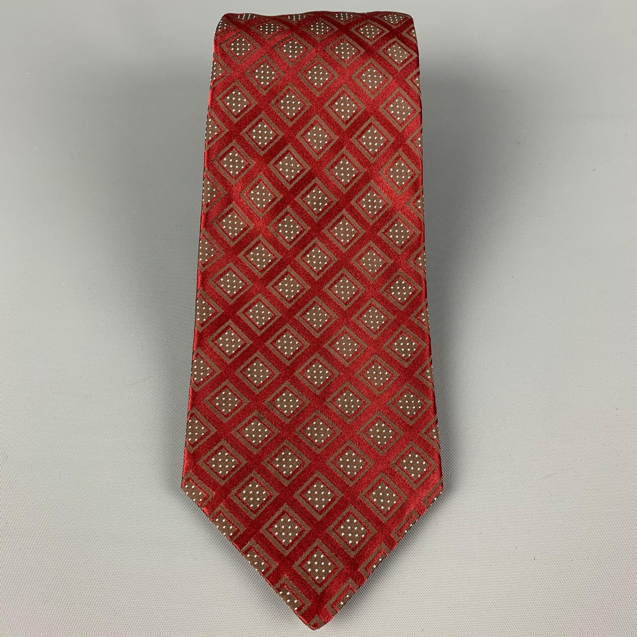 KITON necktie comes in a burgundy & taupe silk with a all over rhombus print. Made in Italy . Very Good Pre-Owned Condition.Width: 3.75 inches Length: 60 inches 
 

 

  
  
  
 Sui Generis Reference: 120365
 Category: Tie
 More Details
  
 Brand: