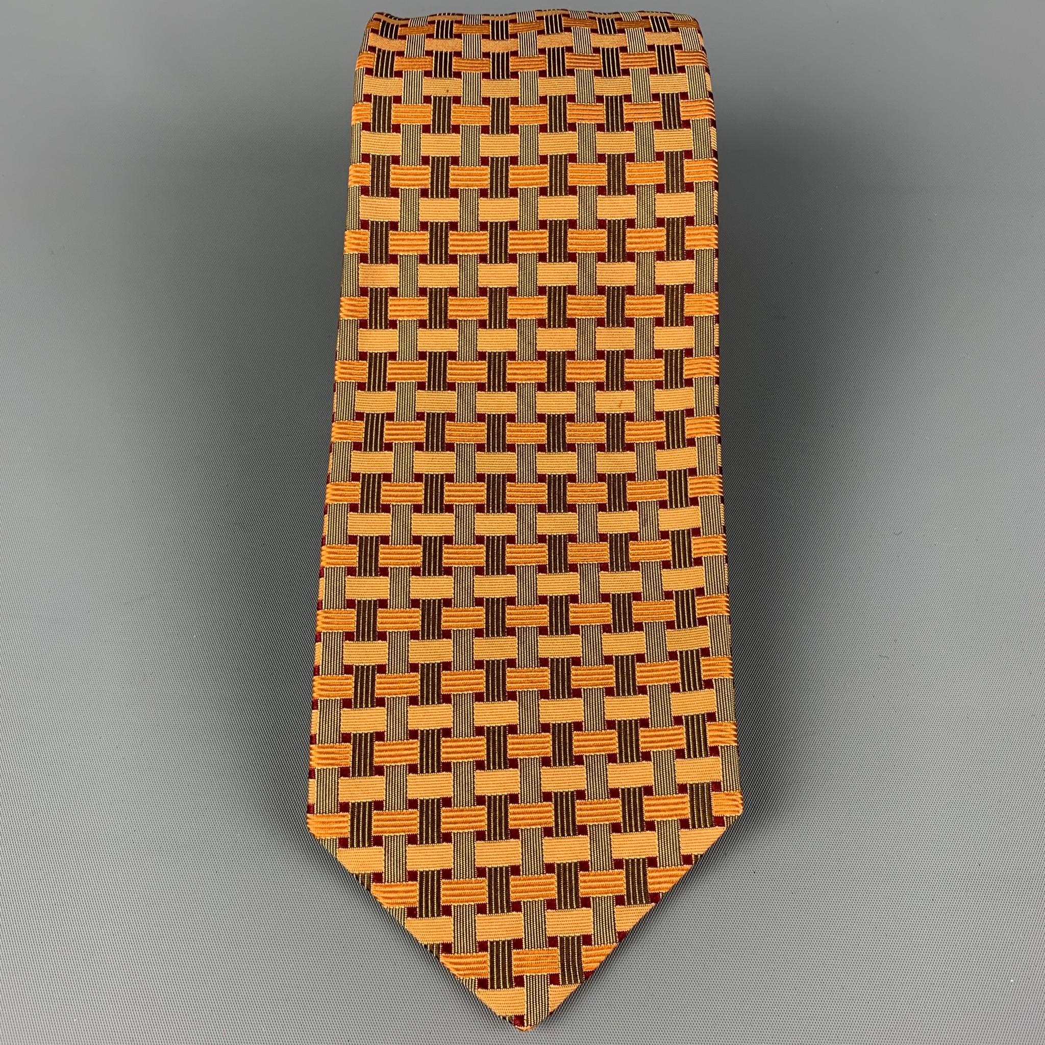 KITON necktie comes in a gold & burgundy silk with a all over woven print. Made in Italy .

Very Good Pre-Owned Condition.
Original Retail Price: $345.00

Width: 3.75 in.
Length: 60 in. 

 