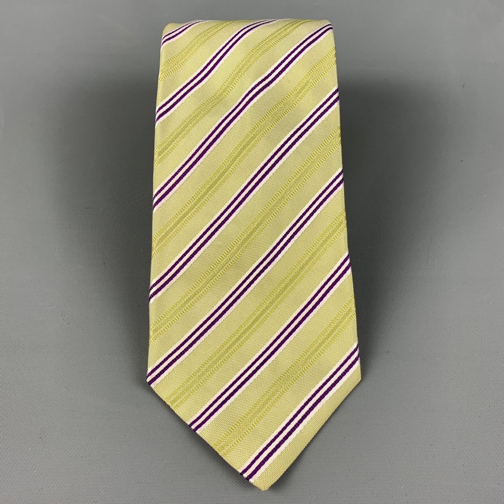KITON necktie comes in bright green and purple diagonal stripes.
Very Good Pre-Owned Condition.
 

Measurements: 
  
Width:4 inches 
Length:58 inches 

  
  
 
Reference: 124869
Category: Tie
More Details
    
Brand:  KITON
Gender:  Male
Color: 