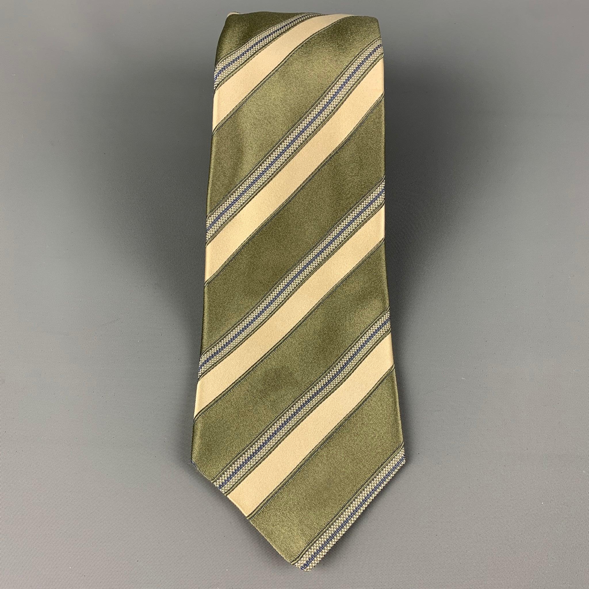 KITON necktie comes in a moss & yellow silk with a all over diagonal stripe print. Made in Italy . Good Pre-Owned Condition. Light discoloration. As-Is.Width: 3.75 inches  Length: 62 inches 


  
  
 
Reference: 120377
Category: Tie
More Details
   