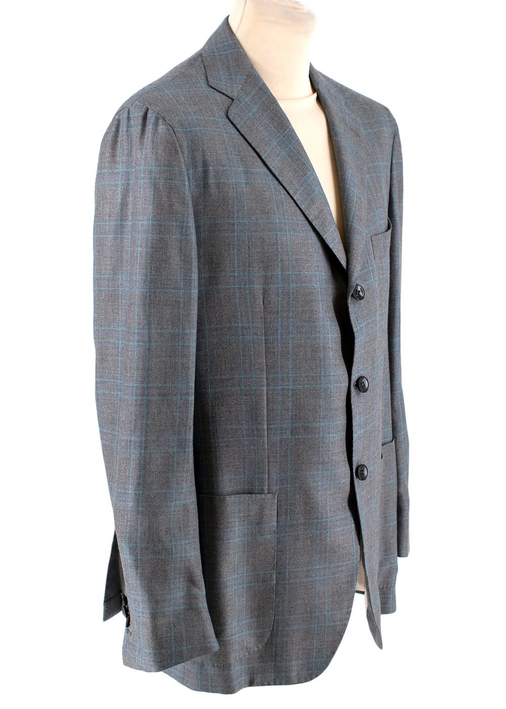 Kiton Napoli Grey & Blue Checked Cashmere & Silk Jacket
-Soft cashmere and silk blend material
-Three pockets on front
-Three button enclosures down front
-Three interior pockets
-Four buttons on cuffs
-Notched lapels
-Partially lined
-Vents on