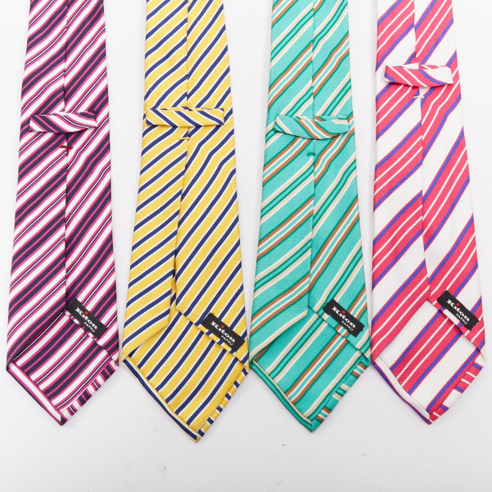 KITON NAPOLI Set de 4 100% seda verde rosa amarillo morado  corbata de rayas diagonales
Referencia: TGAS/F00052
Marca: Kiton
Material: Seda
Color: Multicolor
Patrón: A rayas
Fabricado en: Italia

CONDICIÓN:
Estado: Muy bueno, este artículo era de