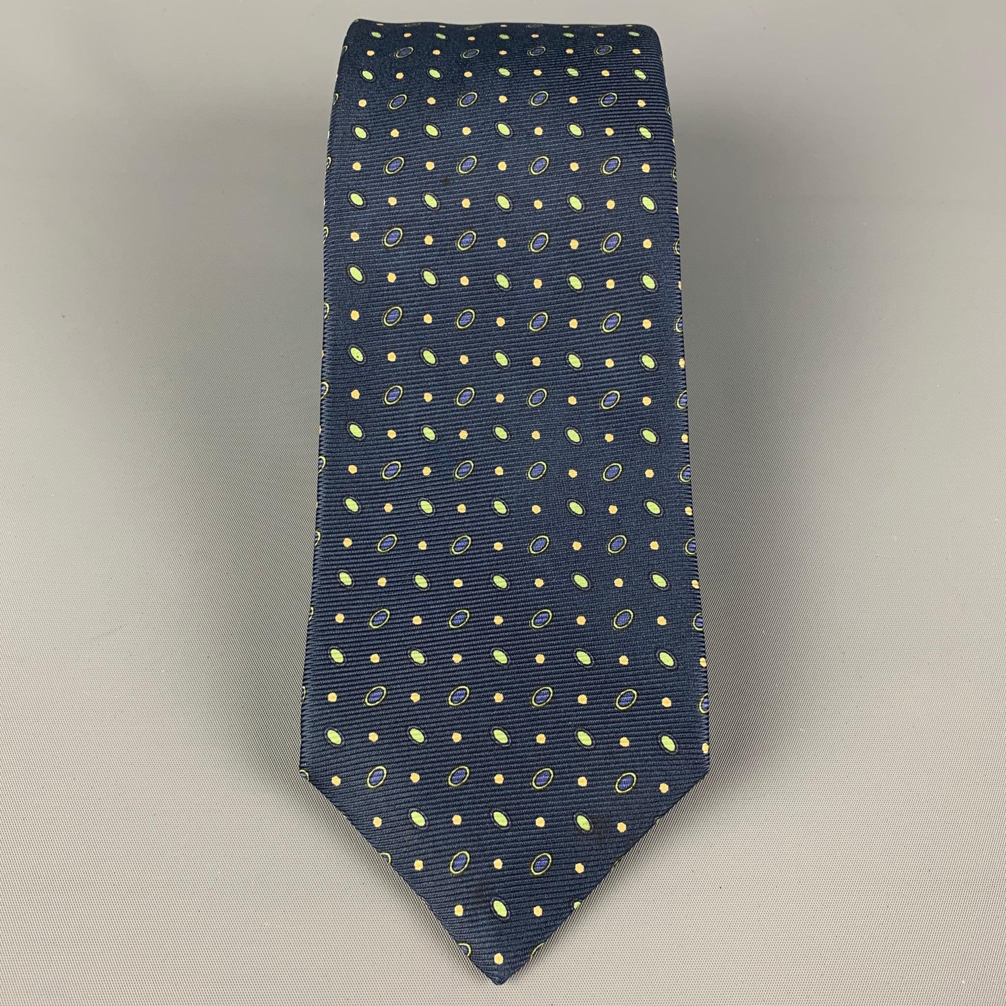 KITON necktie comes in a navy & green silk with a all over dot print. Made in Italy . Very Good Pre-Owned Condition. Width: 3.75 inches  Length: 62 inches 


  
  
 
Reference: 120385
Category: Tie
More Details
    
Brand:  KITON
Color:  Navy &