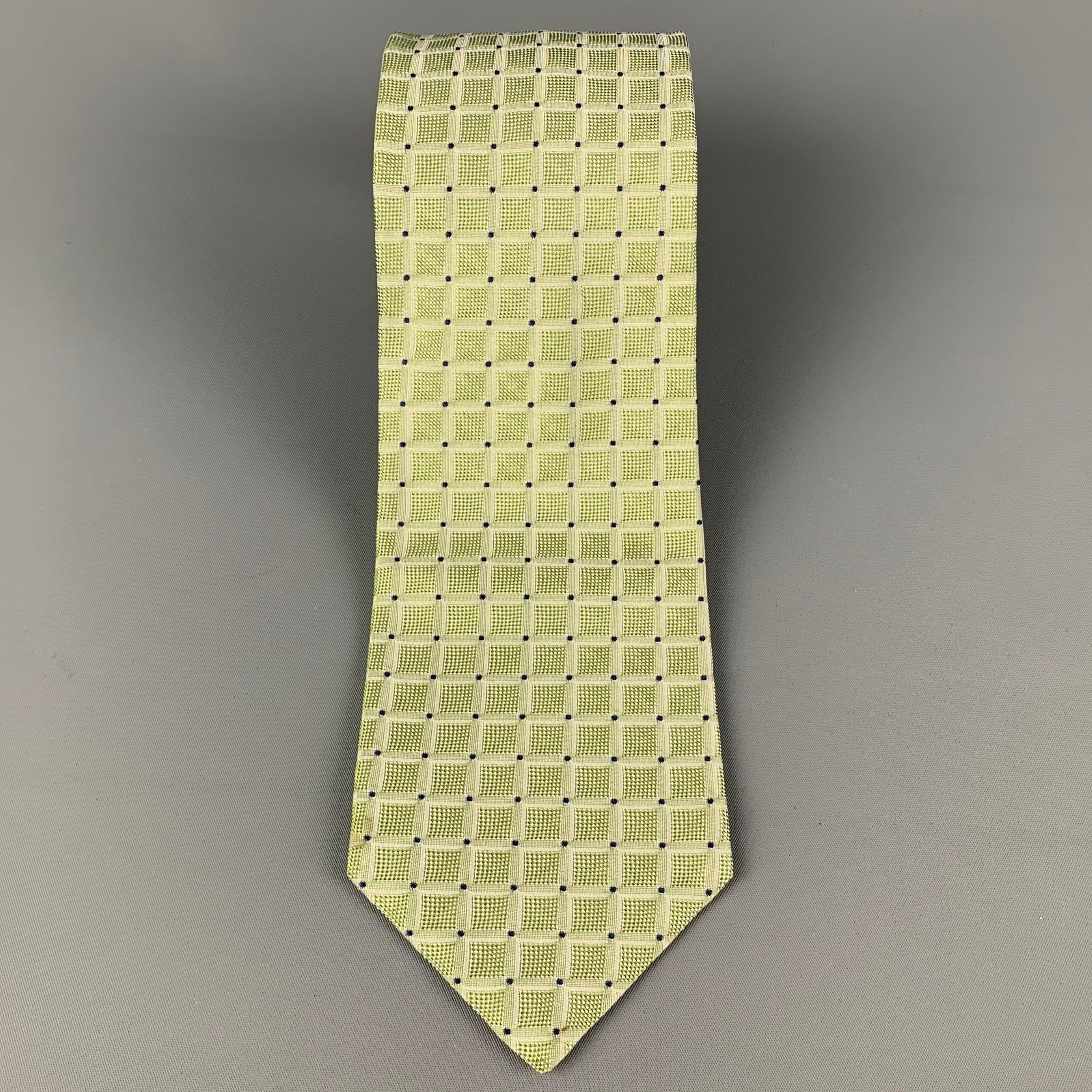 KITON necktie comes in a sage silk with a all over square print. Made in Italy.

Very Good Pre-Owned Condition.
Original Retail Price: $345.00

Width: 3.75 in.
Length: 58 in. 