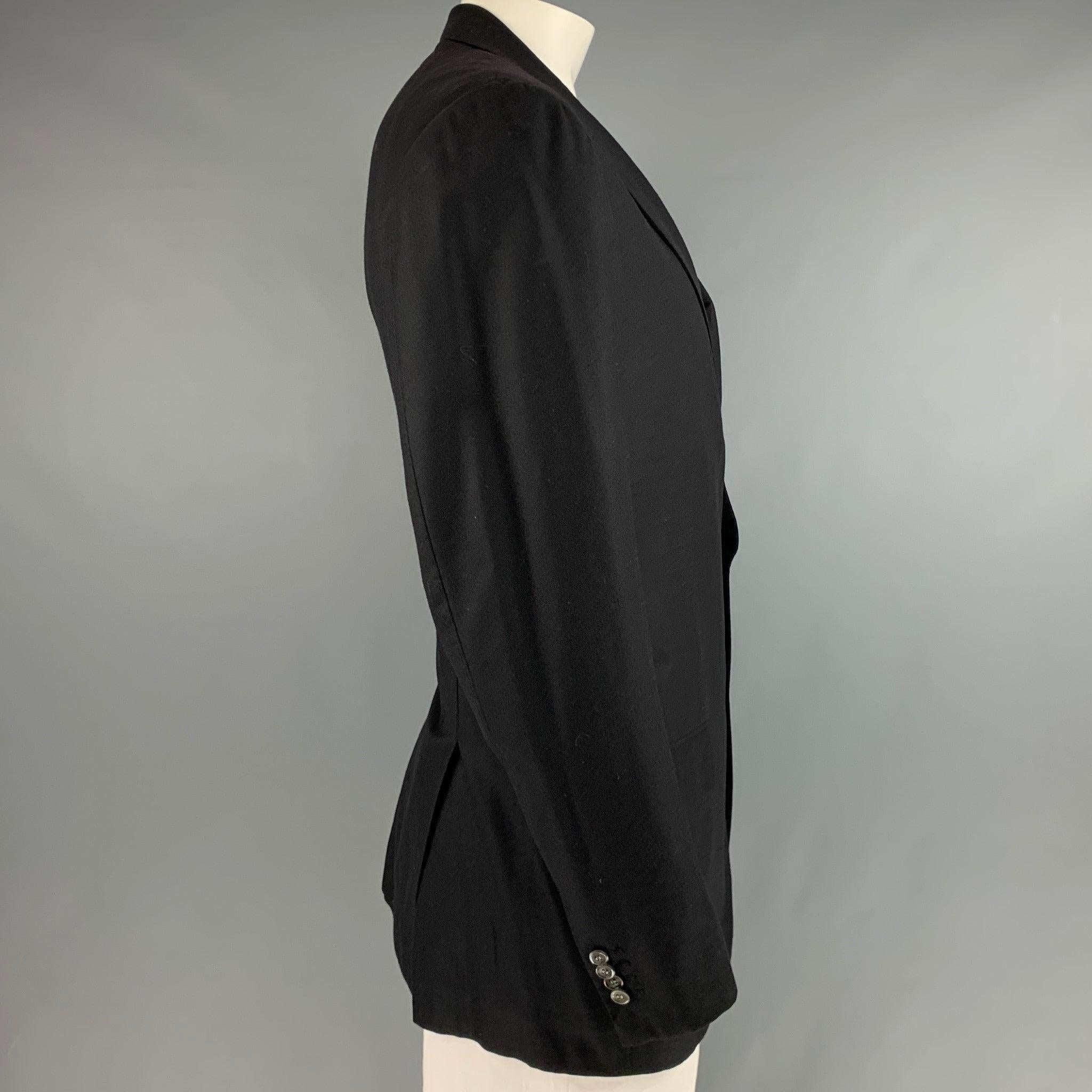 KITON for WILKES BASHFORD
sport coat in a black wool fabric featuring notch lapel, flap pockets, and a double button closure. Made in Italy.Excellent Pre-Owned Condition. 

Marked:   56 

Measurements: 
 
Shoulder: 18.5 inches Chest: 46 inches