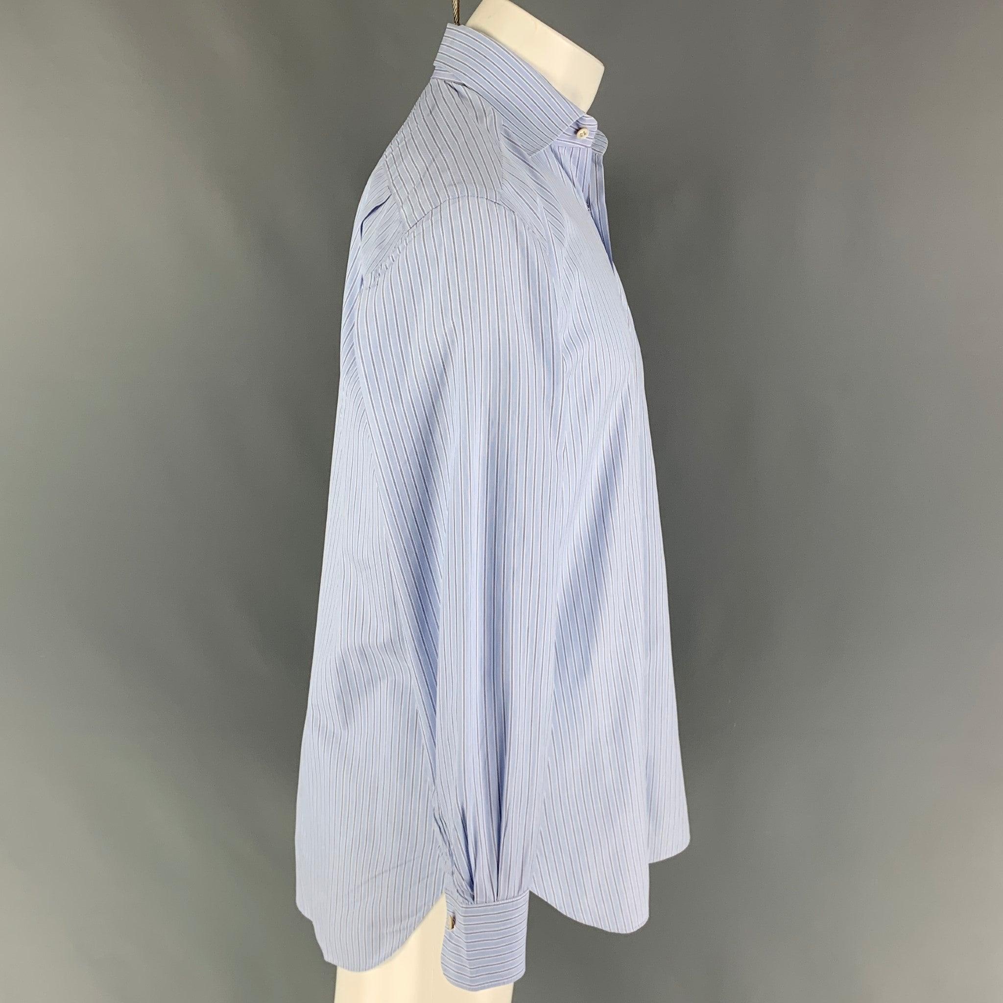 KITON long sleeve shirt comes in a blue & navy stripe cotton featuring a spread collar, patch pocket, and a button up closure. Made in Italy.
Very Good
Pre-Owned Condition.  

Marked:   15.5/39 

Measurements: 
 
Shoulder: 19 inches  Chest: 44