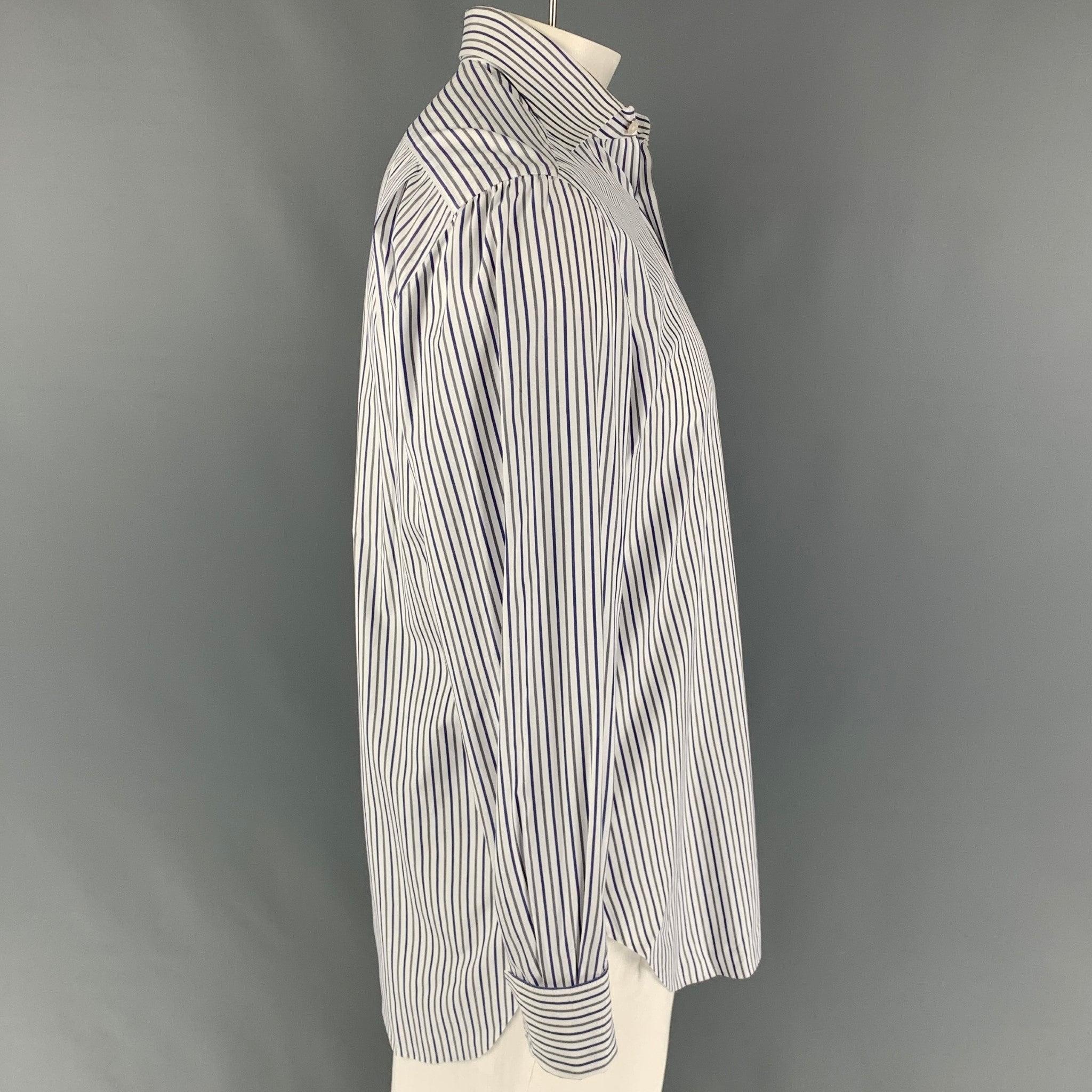 KITON long sleeve shirt comes in a white & blue stripe cotton featuring a spread collar, patch pocket, french cuffs, and a button up closure. Cufflinks not included. Made in Italy.
Very Good
Pre-Owned Condition.  

Marked:   15.5/39 

Measurements: