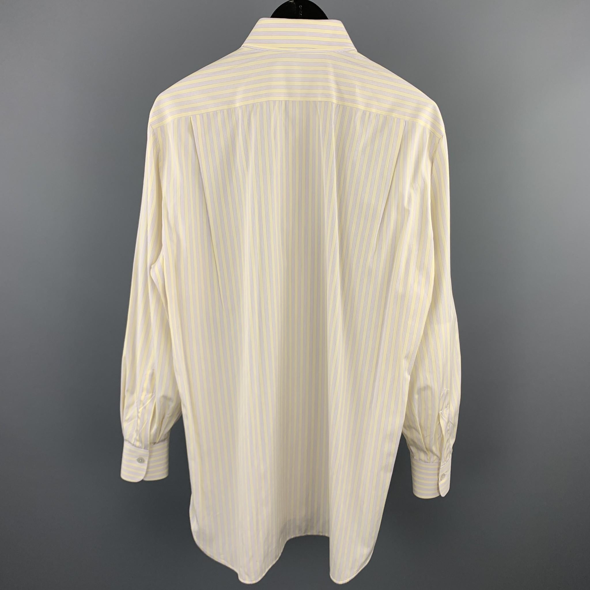 KITON long sleeve shirt comes in a yellow & purple stripe cotton featuring a button up style and spread collar. Made in Italy.

Excellent Pre-Owned Condition.
Marked: 40

Measurements:

Shoulder: 17 in. 
Chest: 43 in. 
Sleeve: 25 in. 
Length: 33.5
