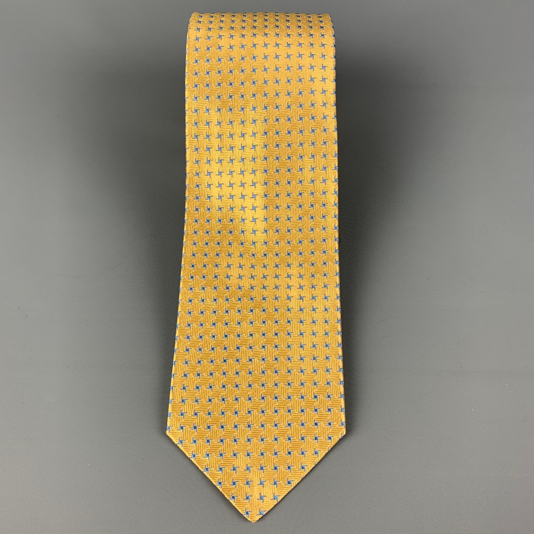 KITON necktie comes in a yellow & blue silk with a all over star print. Made in Italy .

Very Good Pre-Owned Condition.
Original Retail Price: $345.00

Width: 3.5 in.
Length: 58 in. 