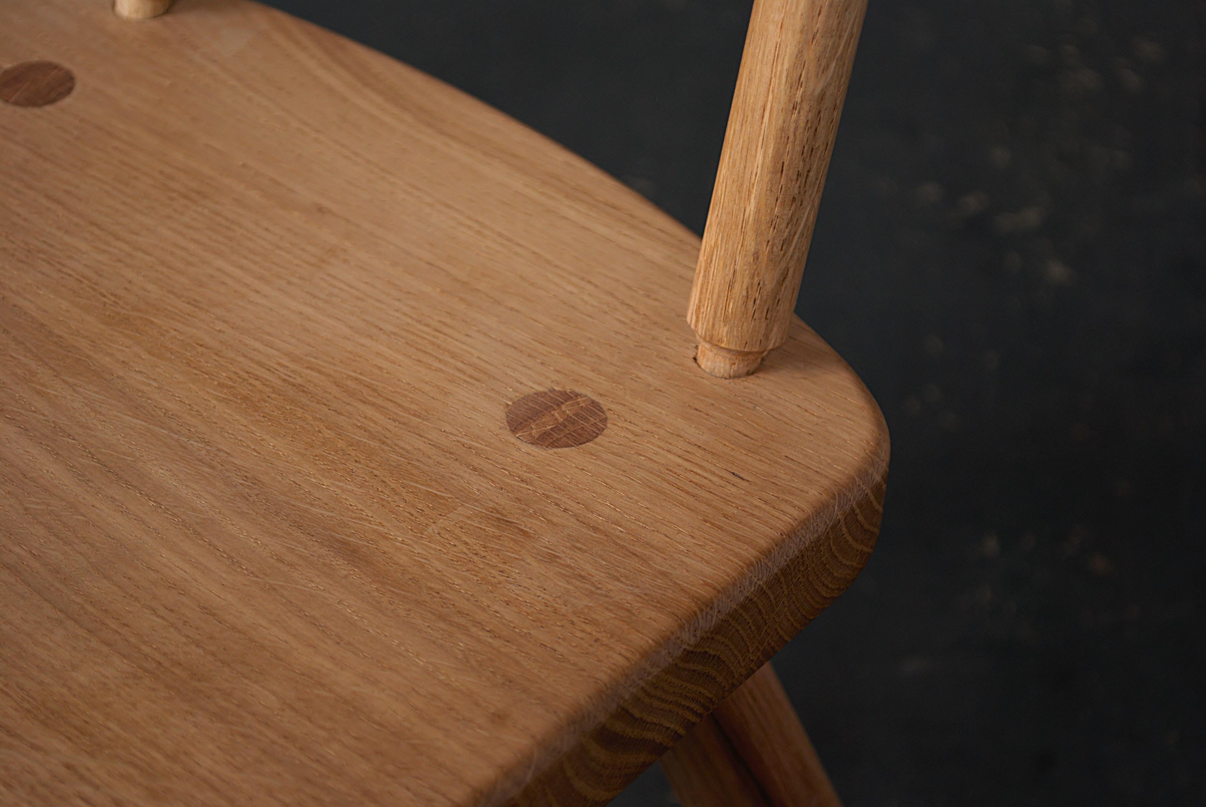 Hand-Carved Kit's Chair For Sale
