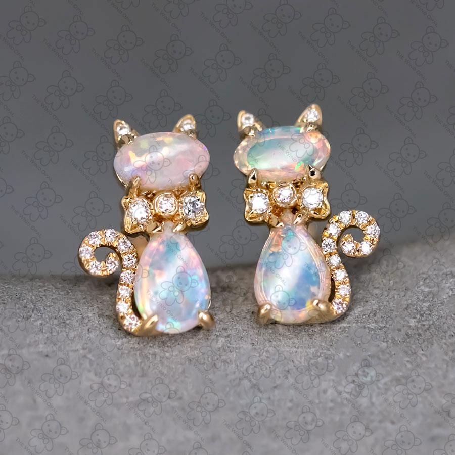 Kitten Cat Australian Solid Opal Diamond Screw Back Stud Earrings  18K Yellow Gold.

Free Domestic USPS First Class Shipping!  Free One Year Limited Warranty!  Free Gift Bag or Box with every order!



Opal—the queen of gemstones, is one of the most