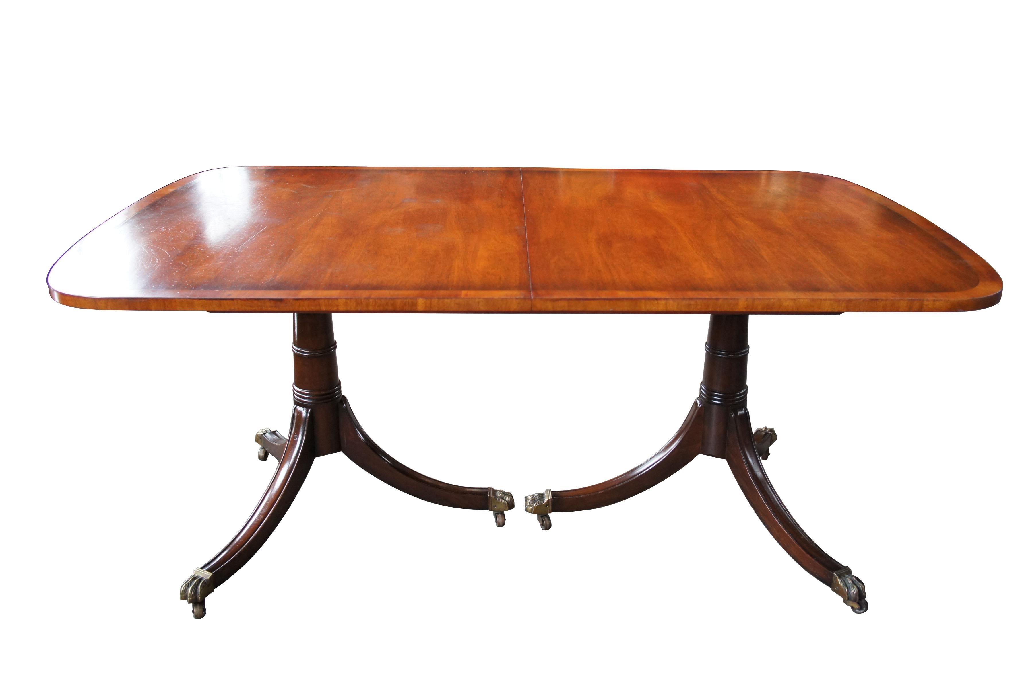 Kittinger antique Duncan Phyfe style banded mahogany dining table claw feet 68
