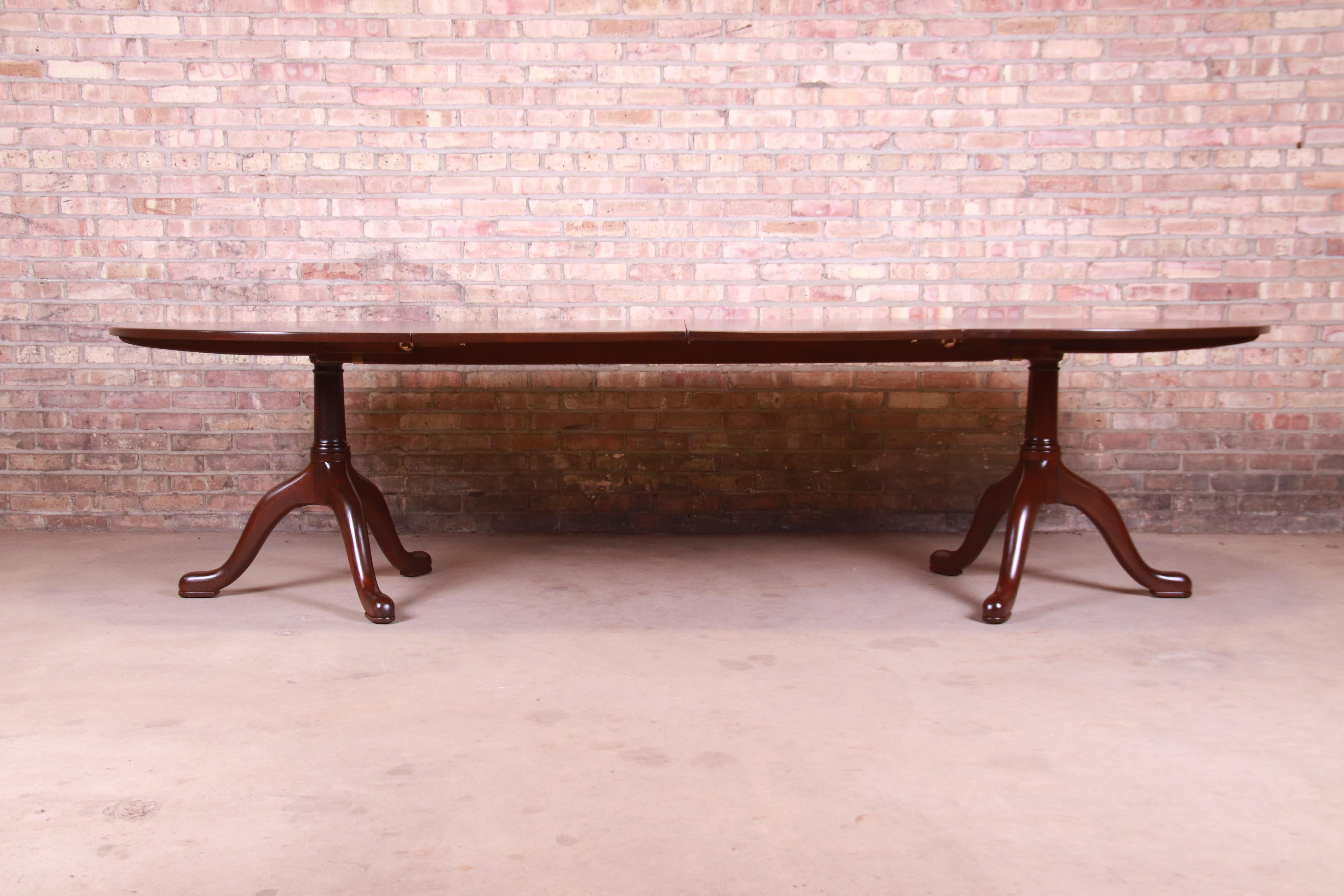 A gorgeous Georgian style solid mahogany double pedestal extension dining table

By Kittinger 