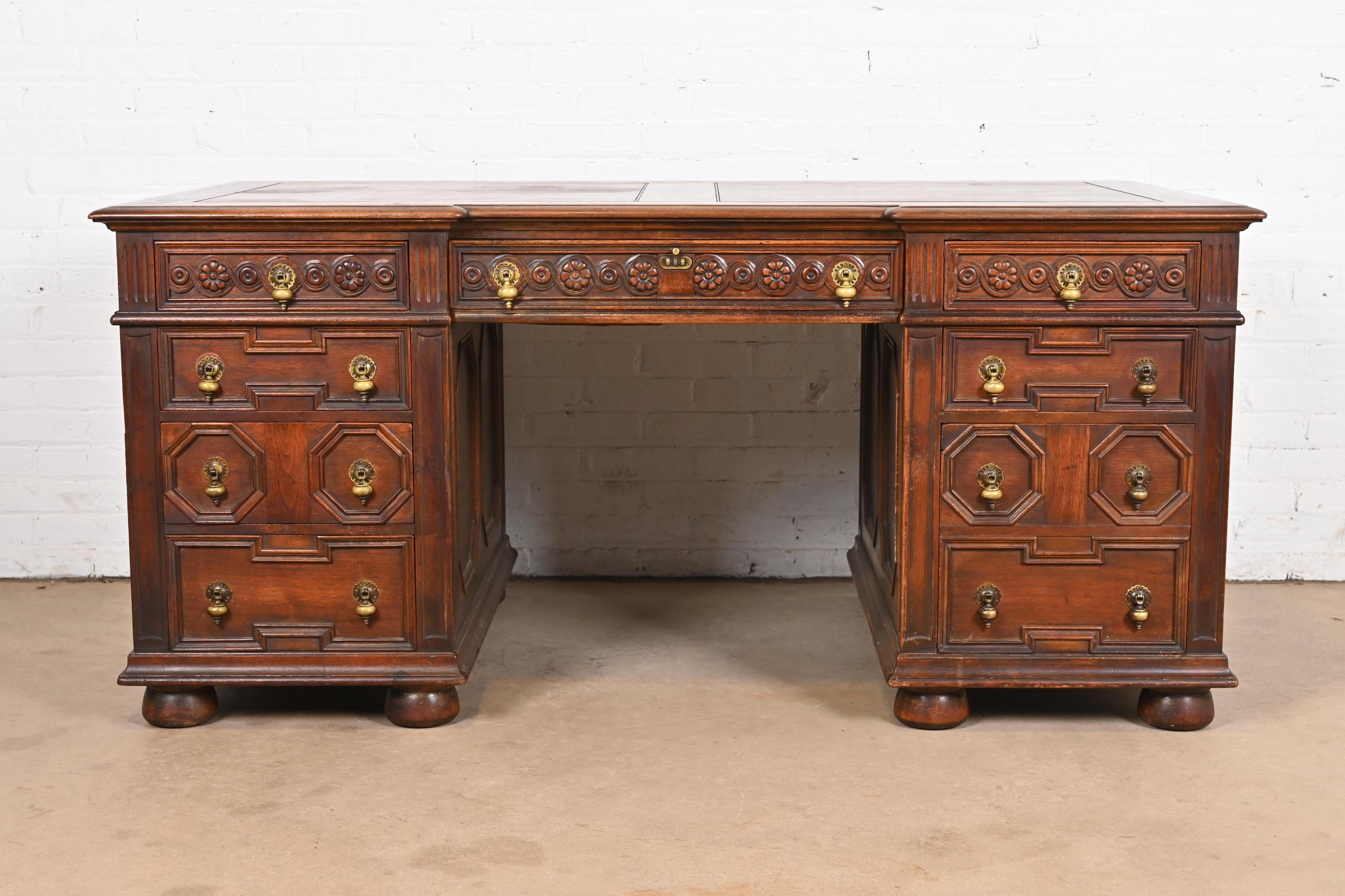 Kittinger English Tudor Carved Walnut Executive Desk, Circa 1920s In Good Condition In South Bend, IN