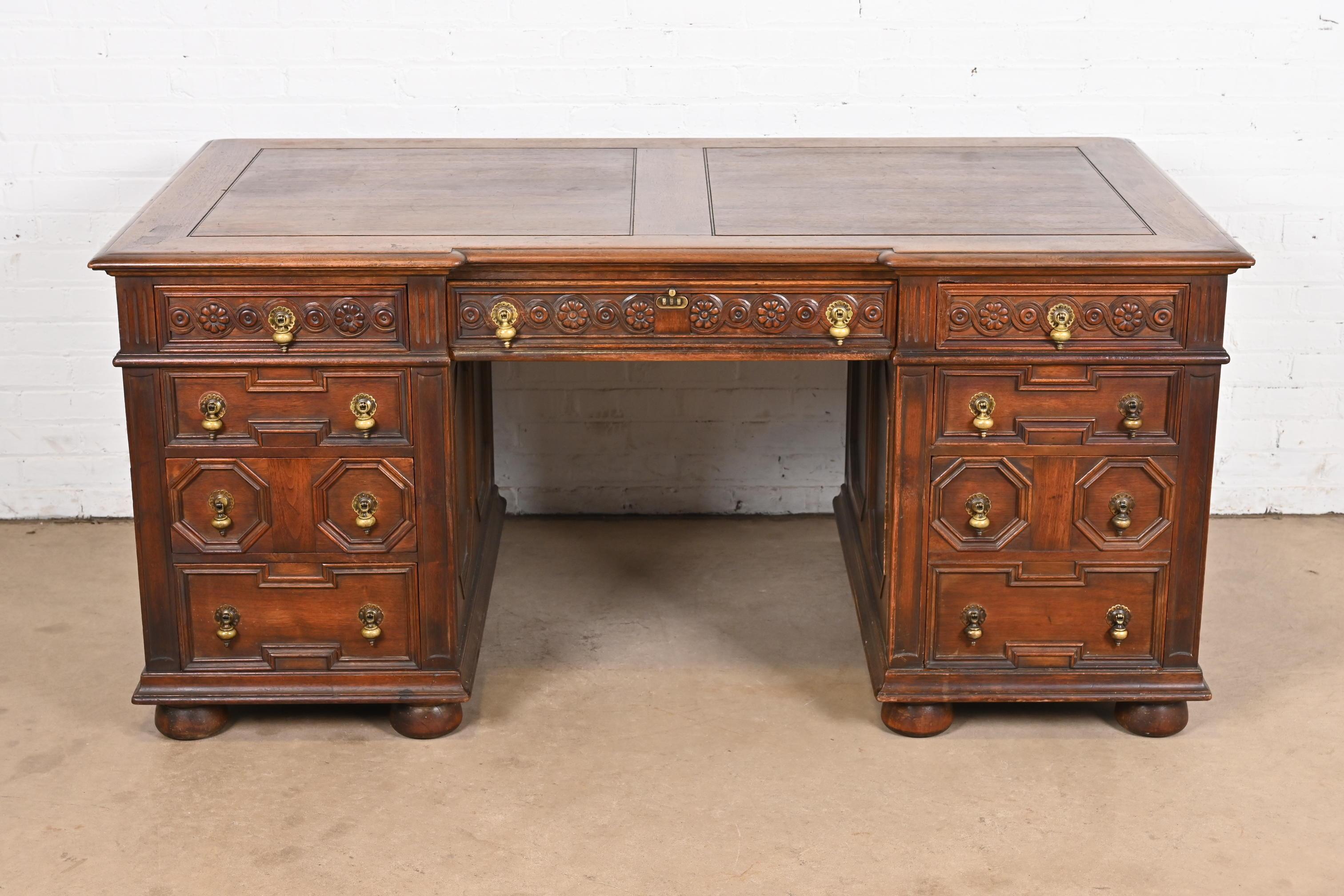 Early 20th Century Kittinger English Tudor Carved Walnut Executive Desk, Circa 1920s