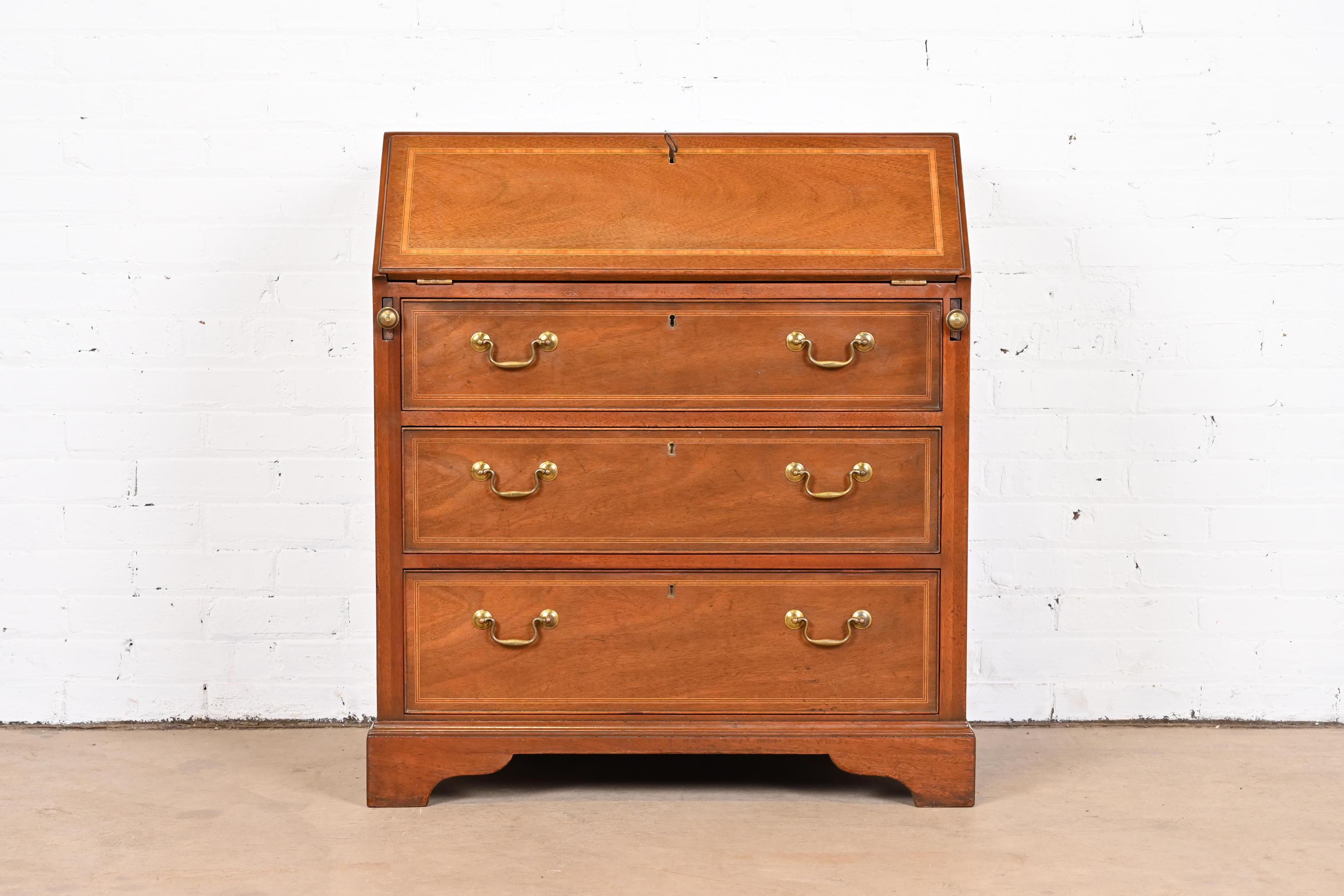 Offering a rare opportunity to own a piece of American history. This gorgeous Georgian slant front secretary desk was commissioned by the White House in the 1970s, most likely by President Richard Nixon. If this desk could talk, oh the stories it