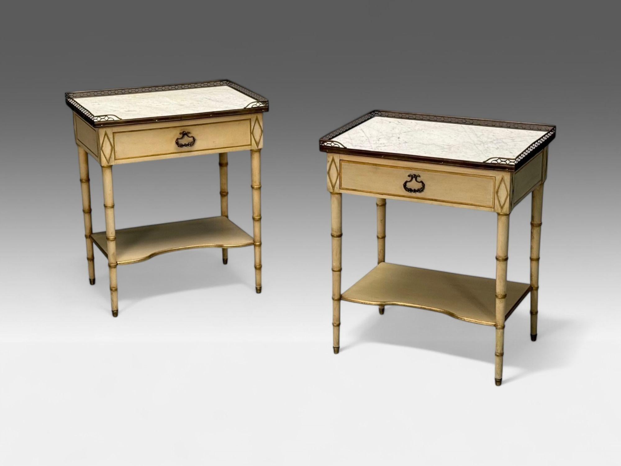 Kittinger, Hollywood Regency Style, Nightstands, Faux Bamboo Painted Wood, Brass21

A pair of Louis XVI style nightstands or end tables designed by Kittinger Furniture Co. in the mid-20th century. Each table features a pierced brass gallery