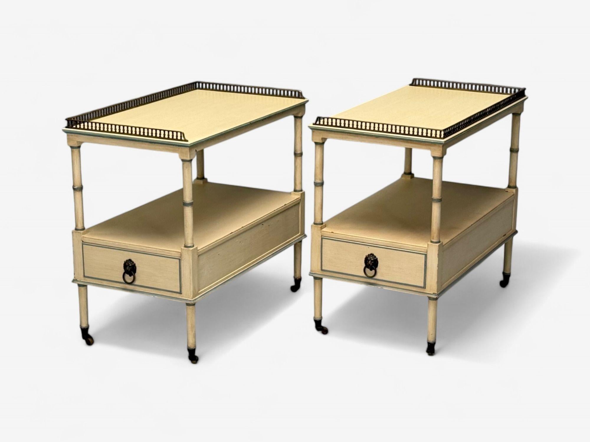Kittinger, Hollywood Regency Style, Side Tables, Faux Bamboo Painted Wood, Brass

A pair of two-tiered Louis XVI style side or end tables produced by Kittinger Furniture Co. in the 1960s, featuring a baby blue and ivory painted finish. Each table is