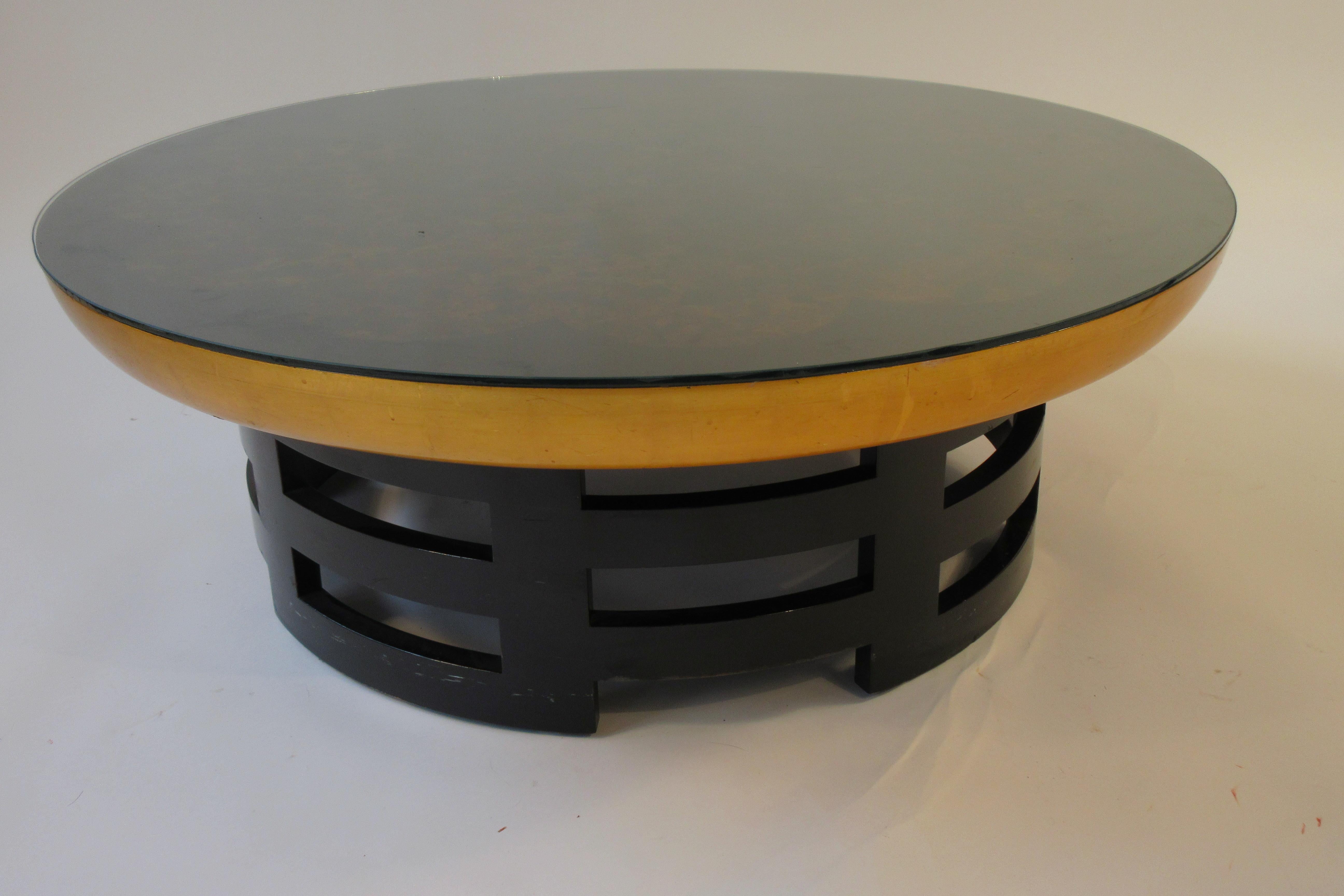 Kittinger Lotus cocktail table by Muller and Barringer with glass top.
