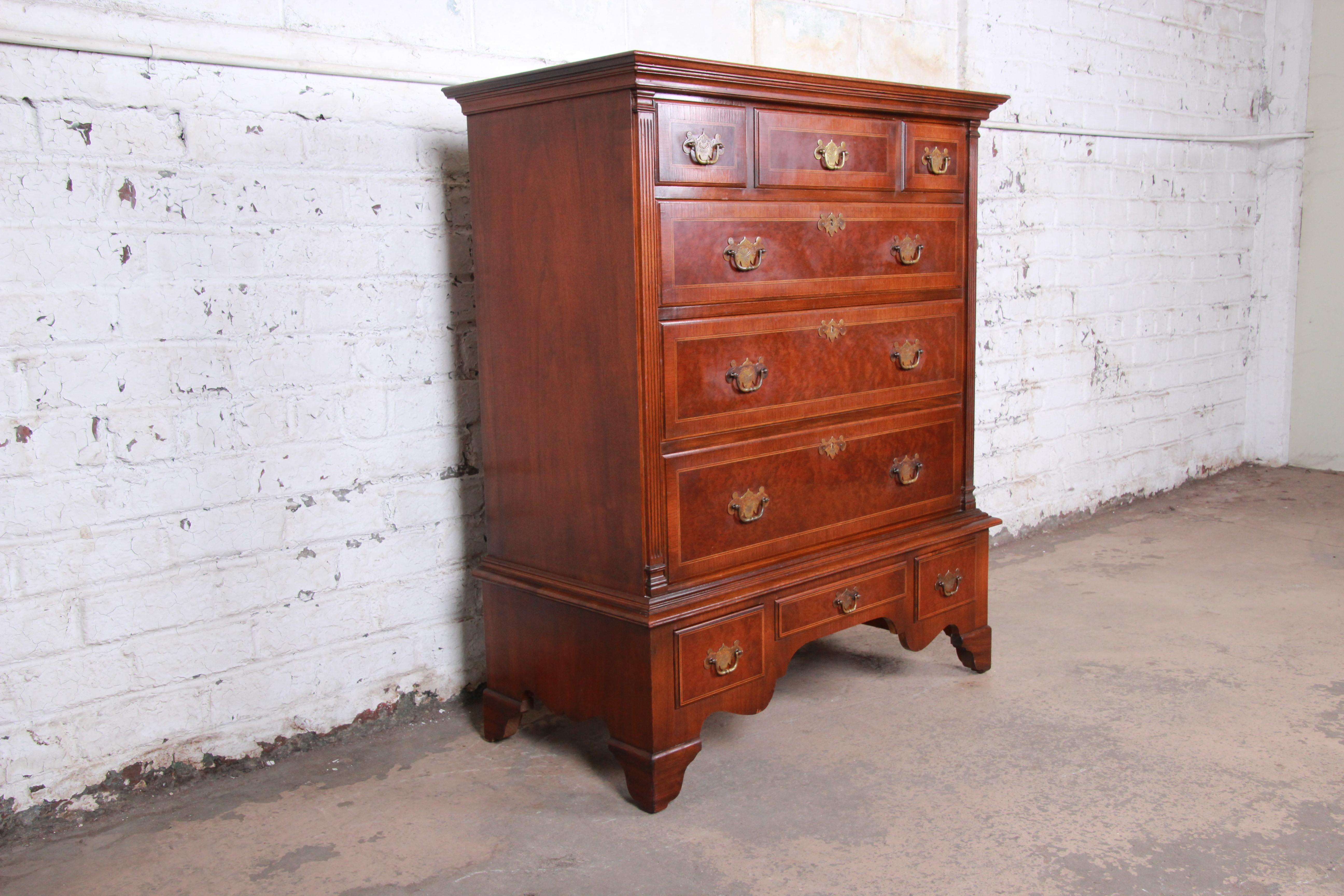 American Kittinger Mahogany and Birdseye Maple Nine-Drawer Highboy Dresser, circa 1930s