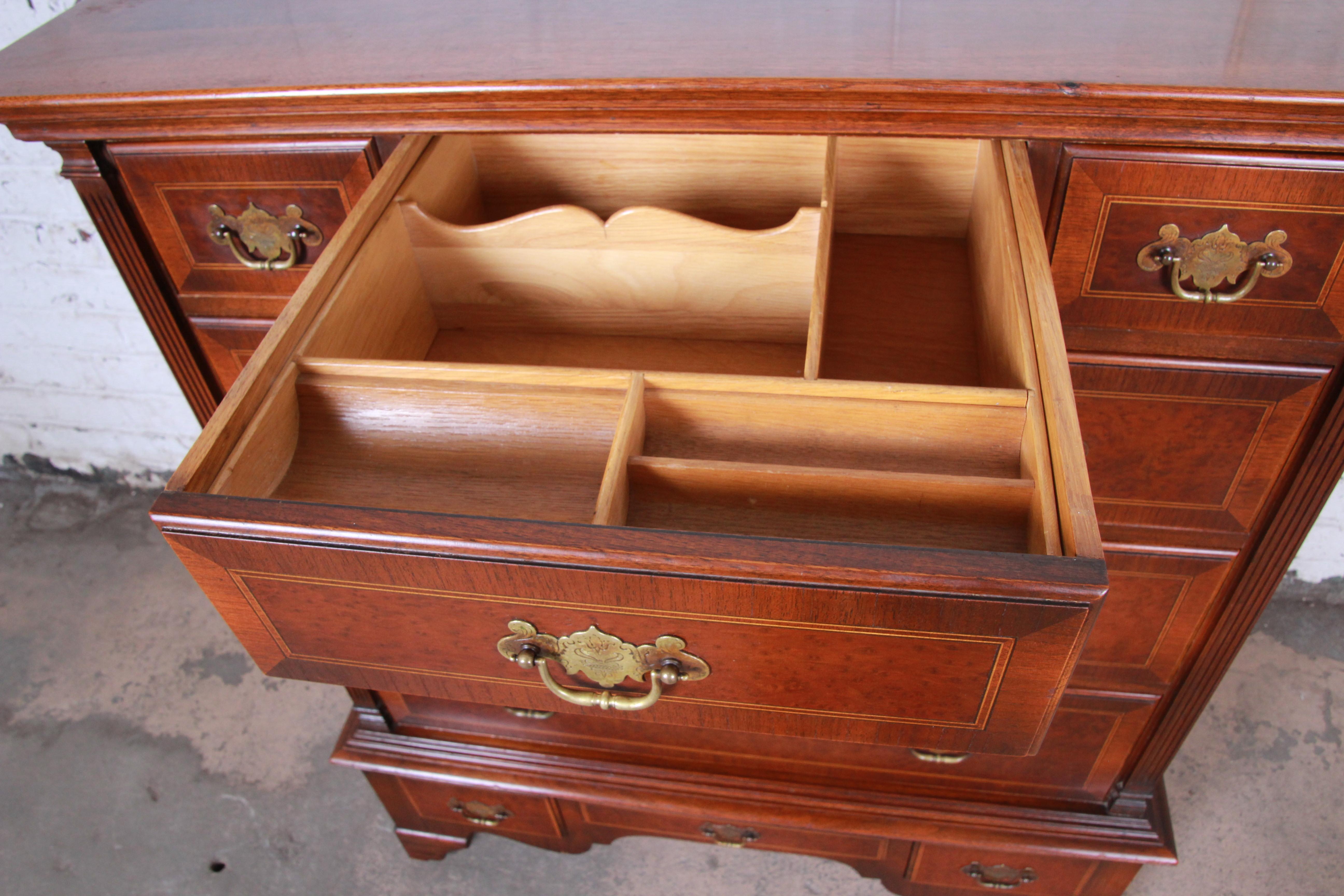 Brass Kittinger Mahogany and Birdseye Maple Nine-Drawer Highboy Dresser, circa 1930s