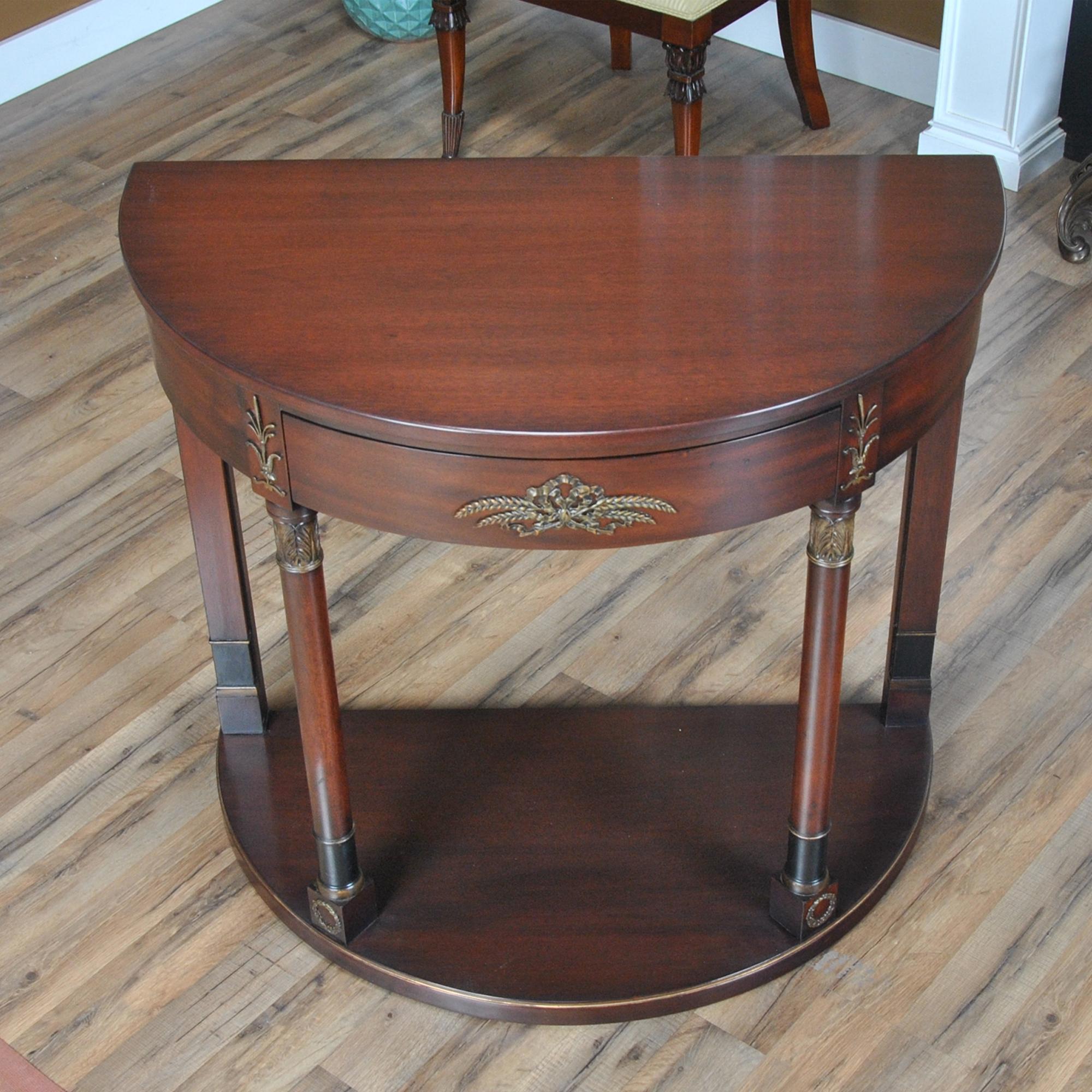 The Kittinger mahogany console with columns, Model A903 in the Kittinger catalog. This stylish piece has fantastic details throughout; including the original condition pull out drawer with solid oak drawer interiors, the solid mahogany turned