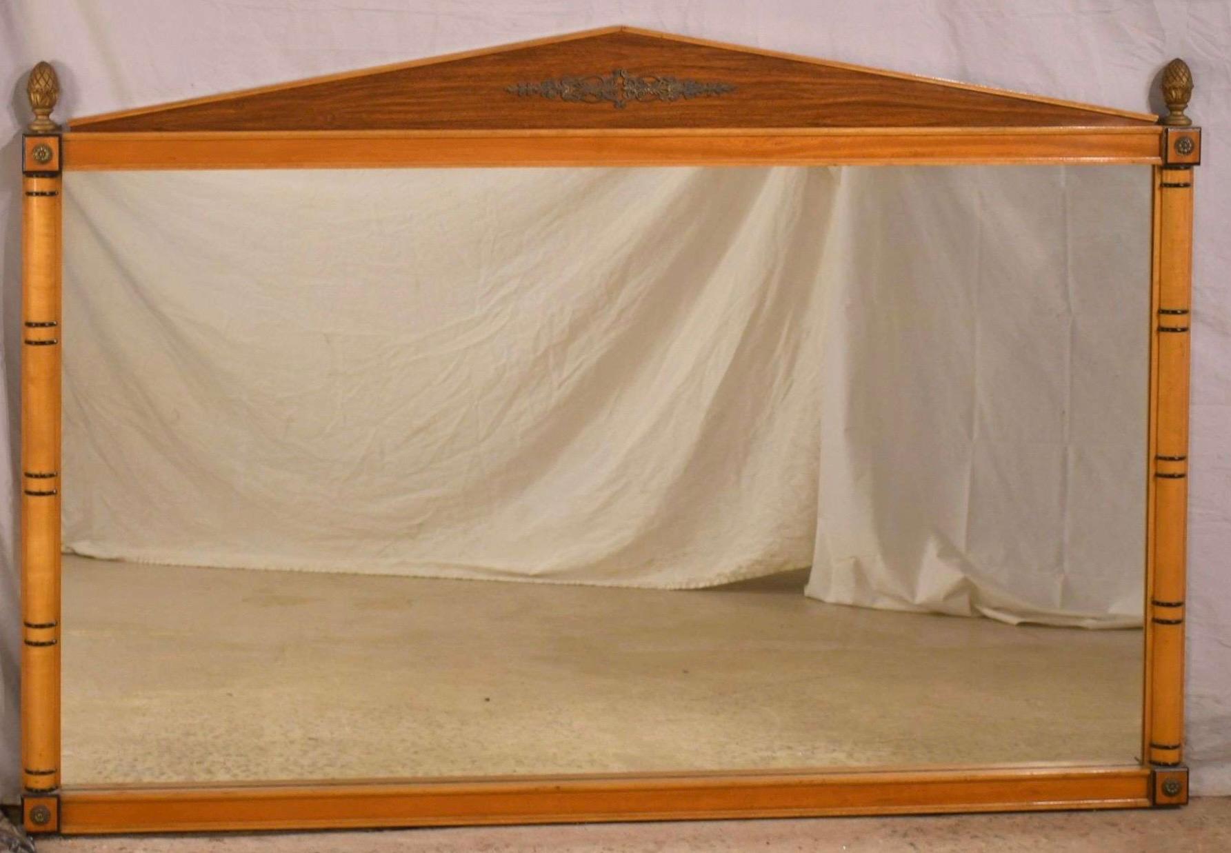 This is the regency style maple faux bamboo inspired mirror that is part of a larger set . It has ebonite’s pin striping and brass pineapple finials. This piece is attributed to Kittinger. 

My shipping is running two to five weeks. Local pick up is