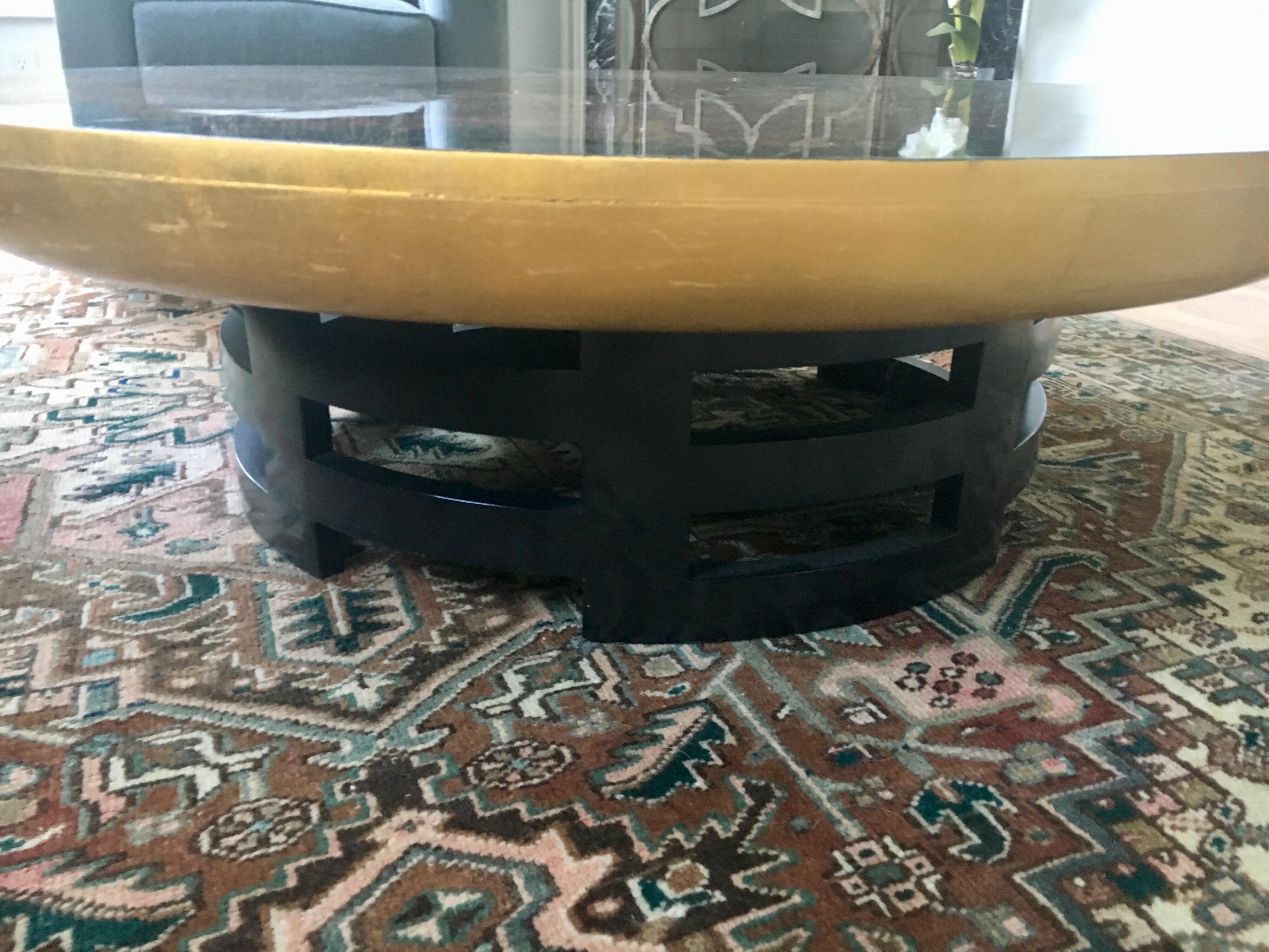 Coveted 1950s Hollywood Regency Classic, the Kittinger lotus table. We are selling it without the custom piece of glass on top.