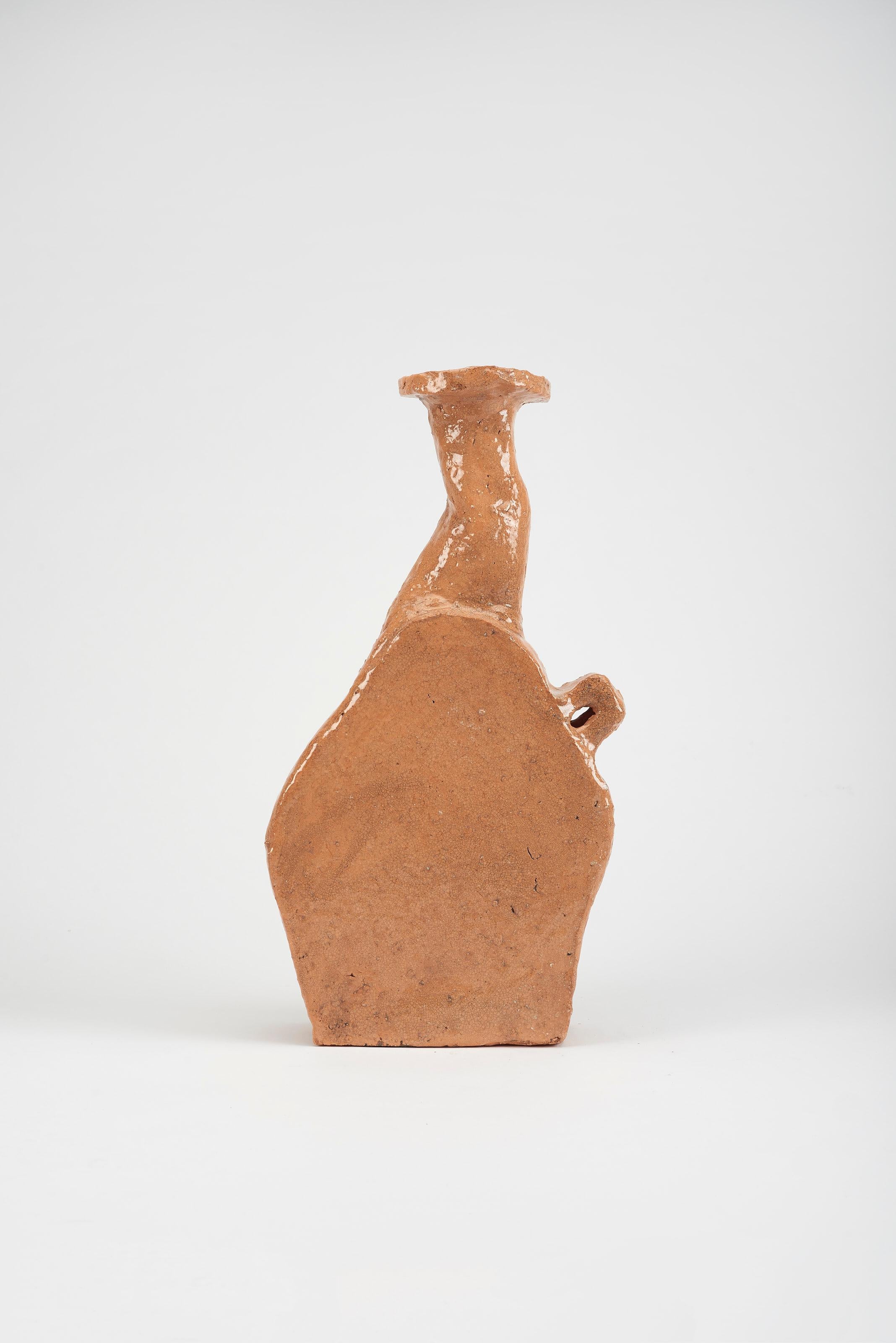 KItu Small Vase by Willem Van Hooff
Dimensions: W 24 x D 7 x H 35 cm (Dimensions may vary as pieces are hand-made and might present slight variations in sizes)
Material: Glazed Ceramics.

Core is a serie of vessels. Inspired by prehistoric african