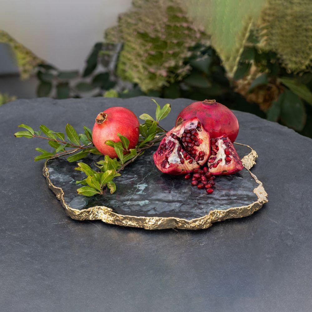 The Kiva Gemstone platters are all unique designs, crafted by mother nature, and imbued with secret powers including bringing clarity and calm to their owners. Each organic shape is framed in 24k gold and designed to show off your culinary creations