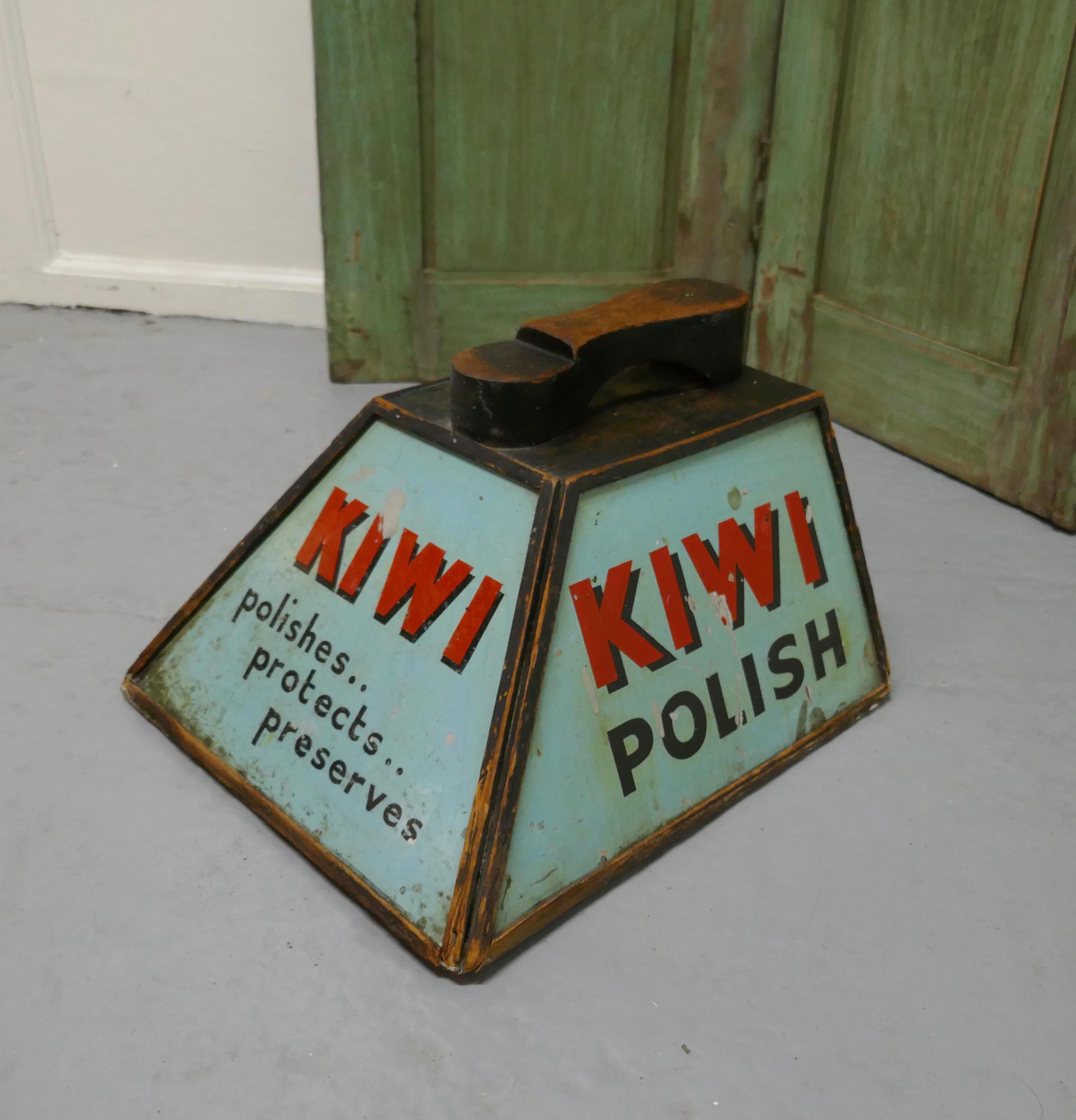 Kiwi Boot polish advertising shoe cleaning box with shoe rest

A handy and attractive little piece, the handle of the polish box doubles up as a rest to put the foot on to polish the shoes, 3 of the sides have enameled advertising signs for Kiwi