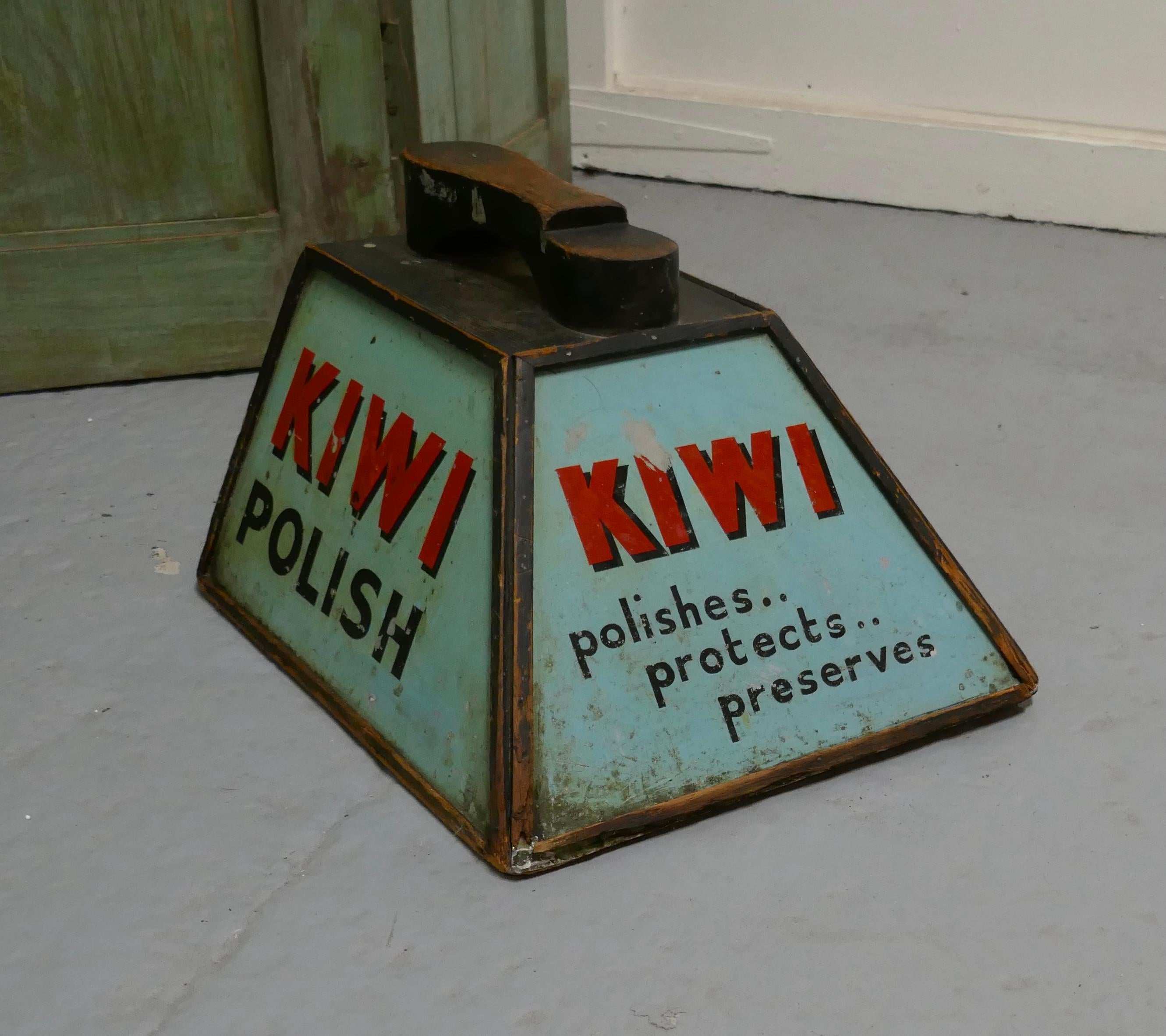 Kiwi Boot Polish Advertising Shoe Shine Box with Shoe Rest

A handy and attractive little piece, the handle of the polish box doubles up as a rest to put the foot on to polish the shoes, 3 of the sides have enamelled advertising signs for KIWI