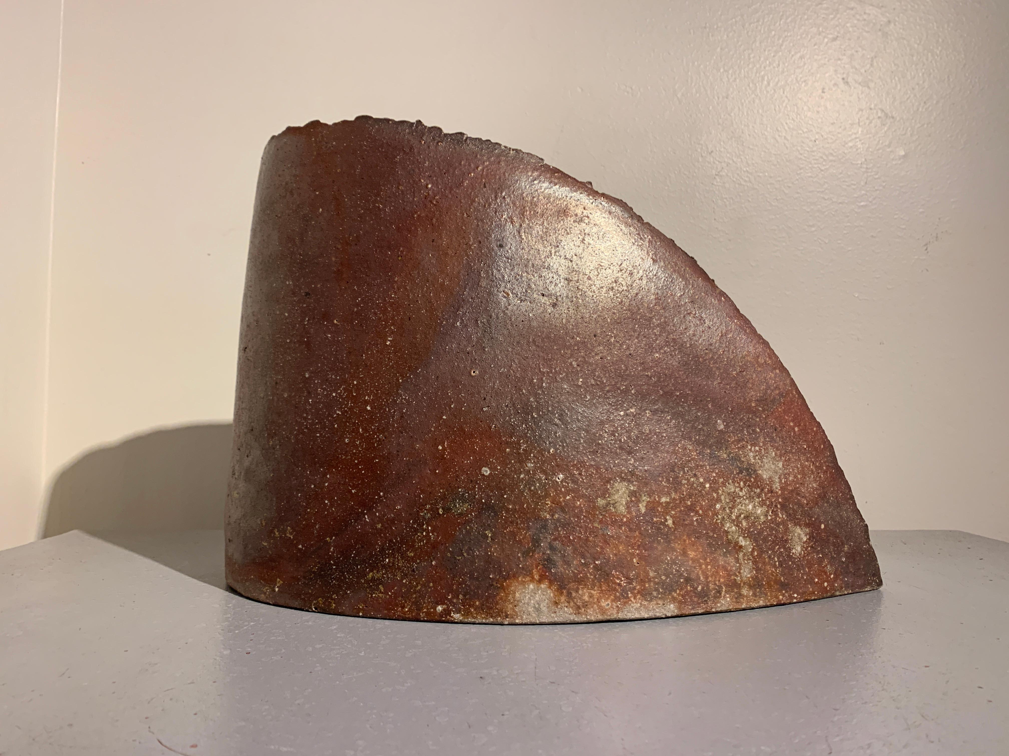A stunning and dramatic contemporary tamba ware vessel with ash glaze by Kyoharu Ichino (b. 1957), circa 2007.

A beautiful study in form and balance, this vessel is highly reminiscent of Richard Serra's large-scale landscape works. There is a